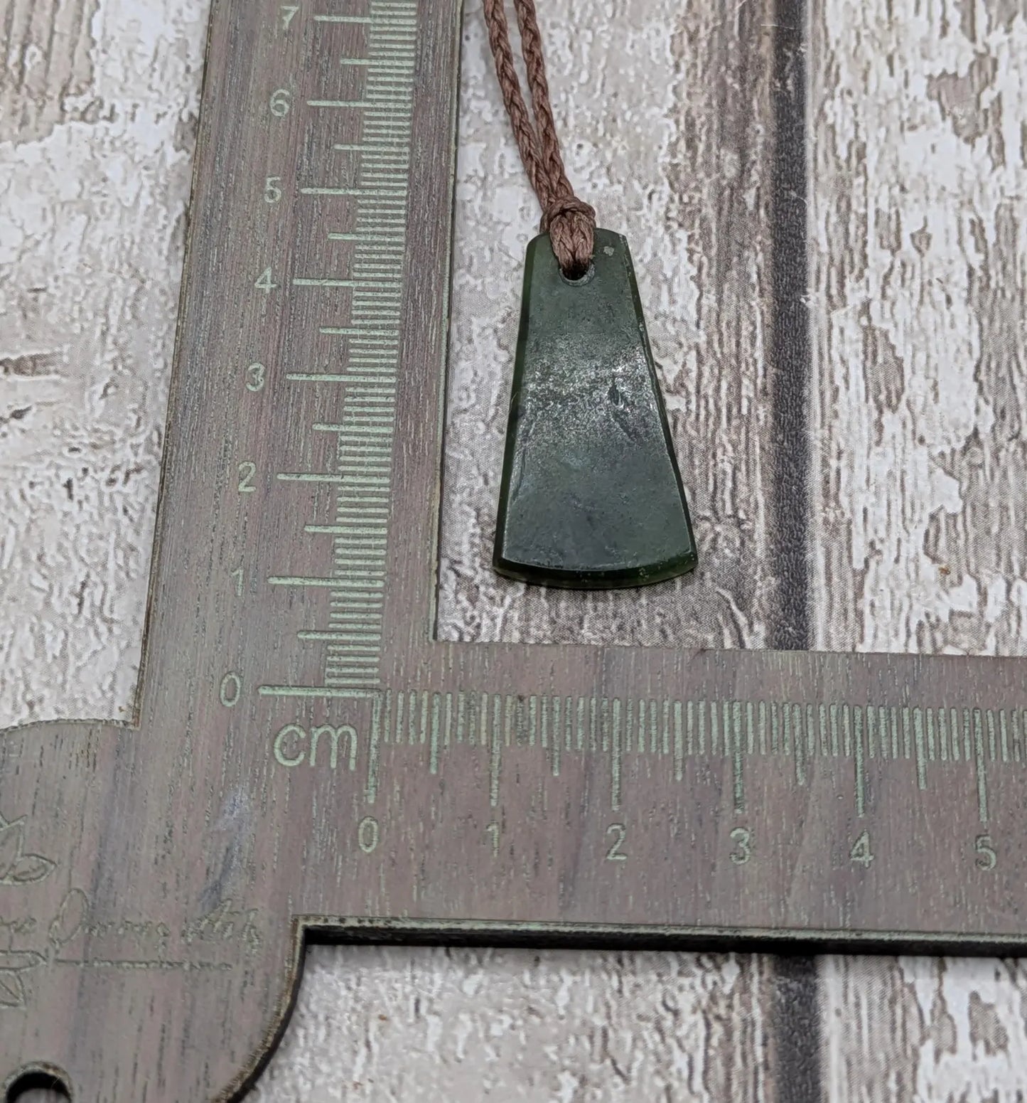 New Zealand Pounamu greenstone drop pendant.