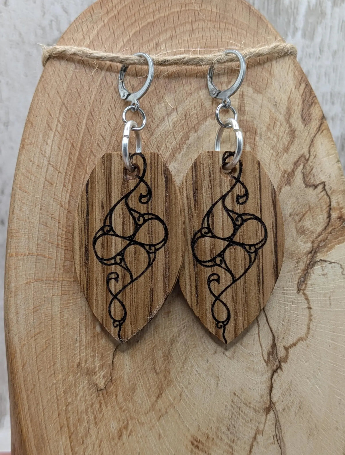 Oak wood British museum Celtic pattern book design earrings with stainless steel findings.