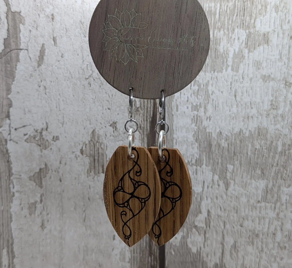 Oak wood British museum Celtic pattern book design earrings with stainless steel findings.