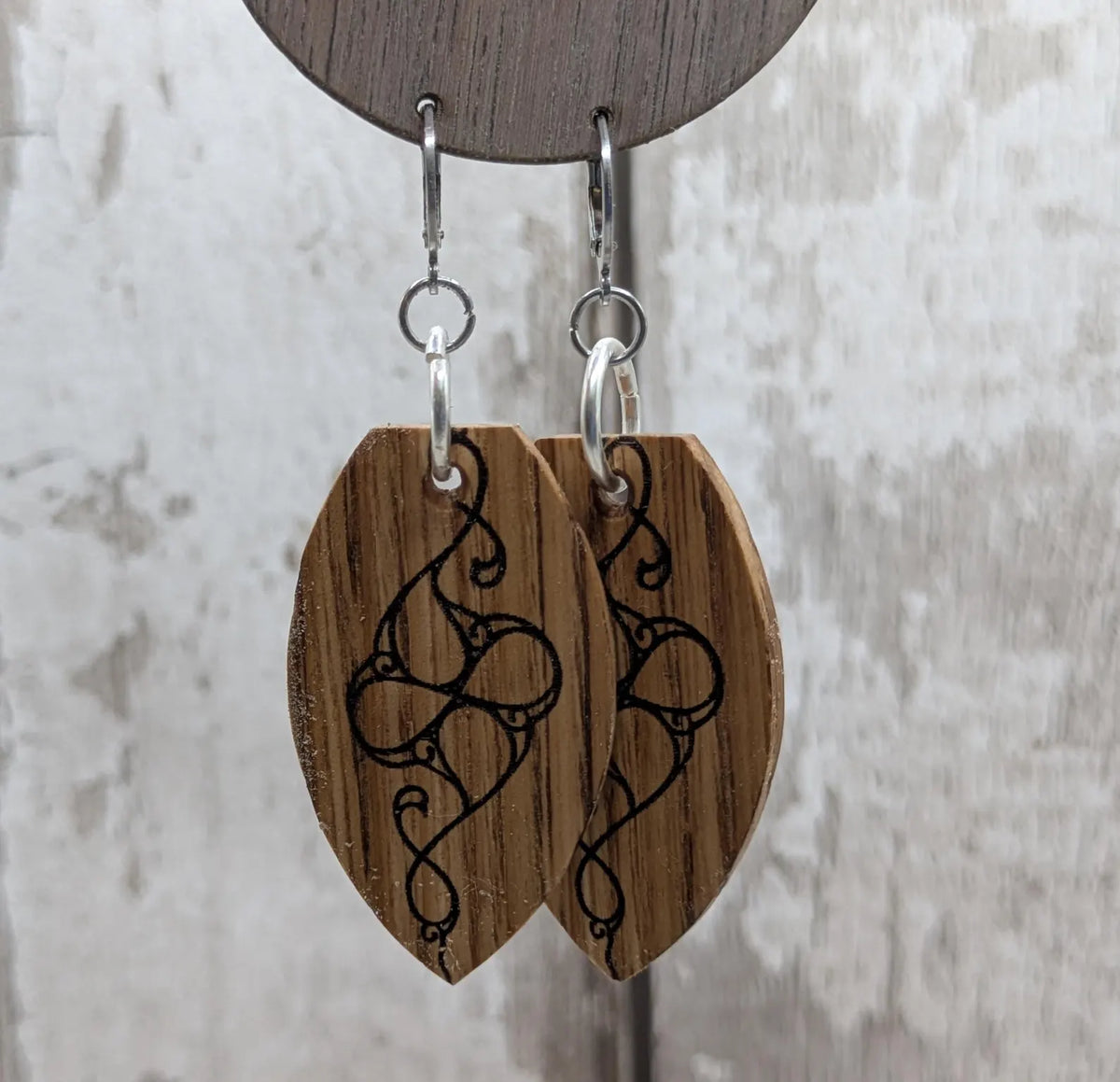 Oak wood British museum Celtic pattern book design earrings with stainless steel findings.