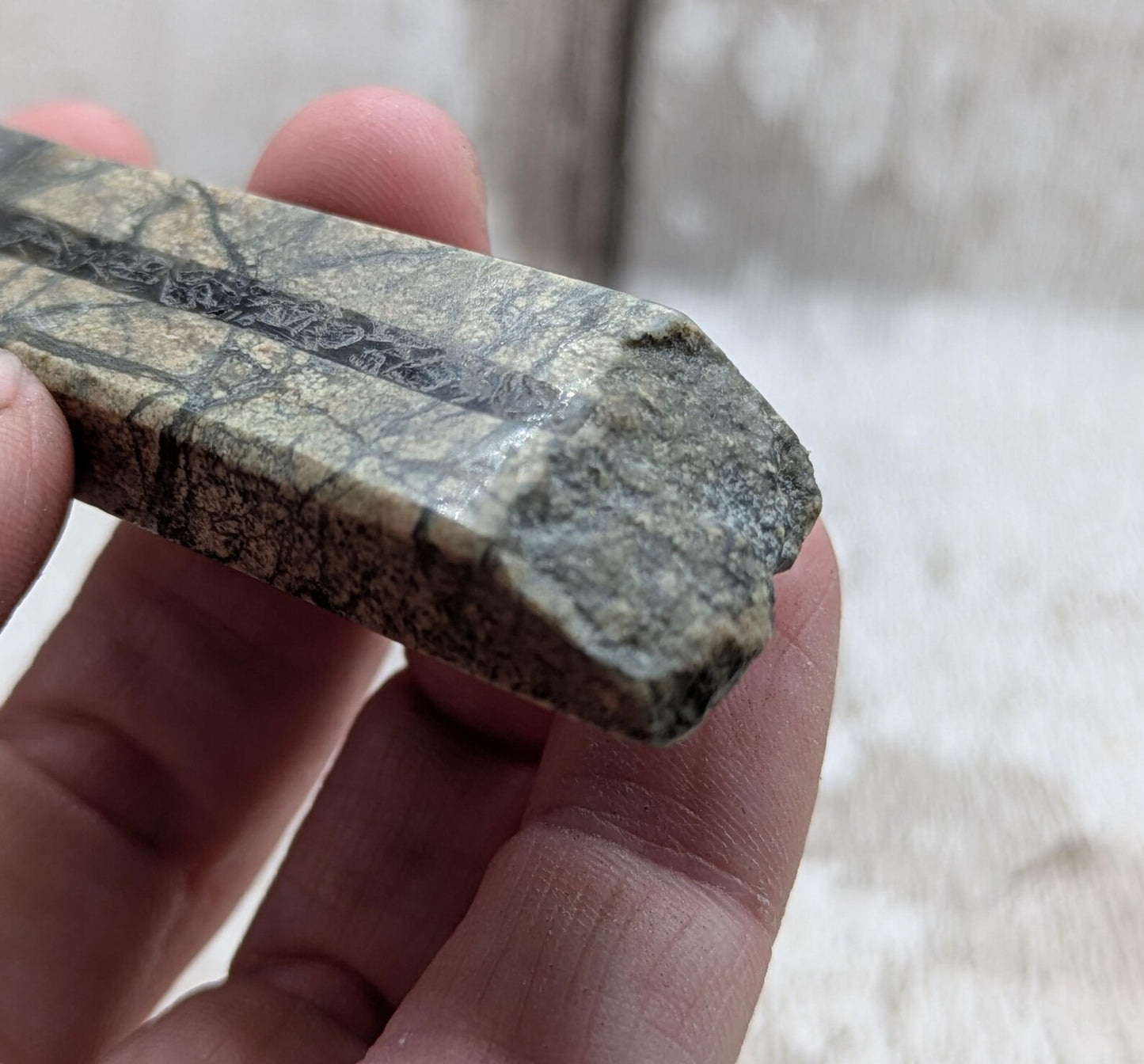 Impactite pendant with mixed tektites and meteorite specimen.