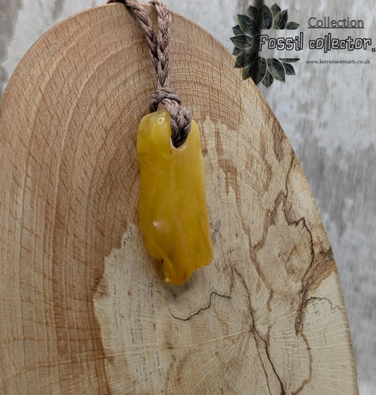 Tumble polished baltic amber pendant.