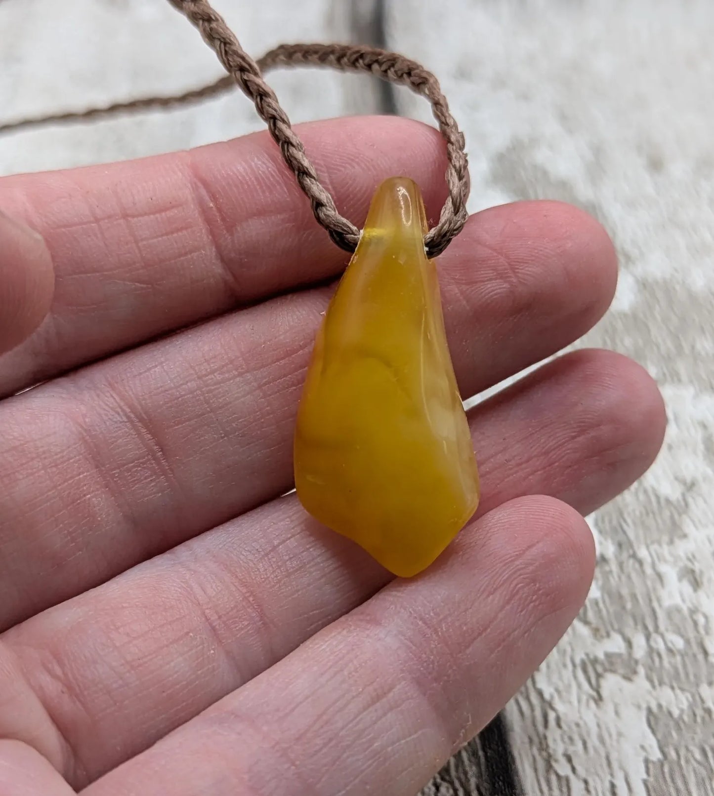 Tumble polished baltic Amber pendant.