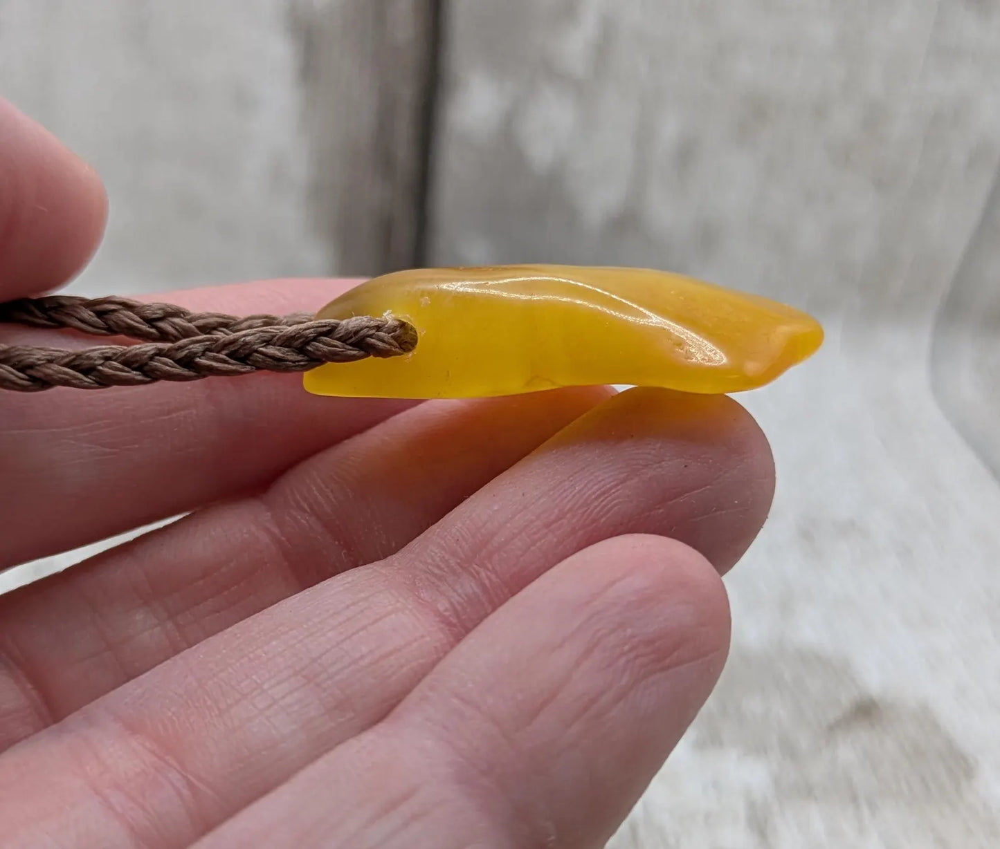 Tumble polished baltic Amber pendant.