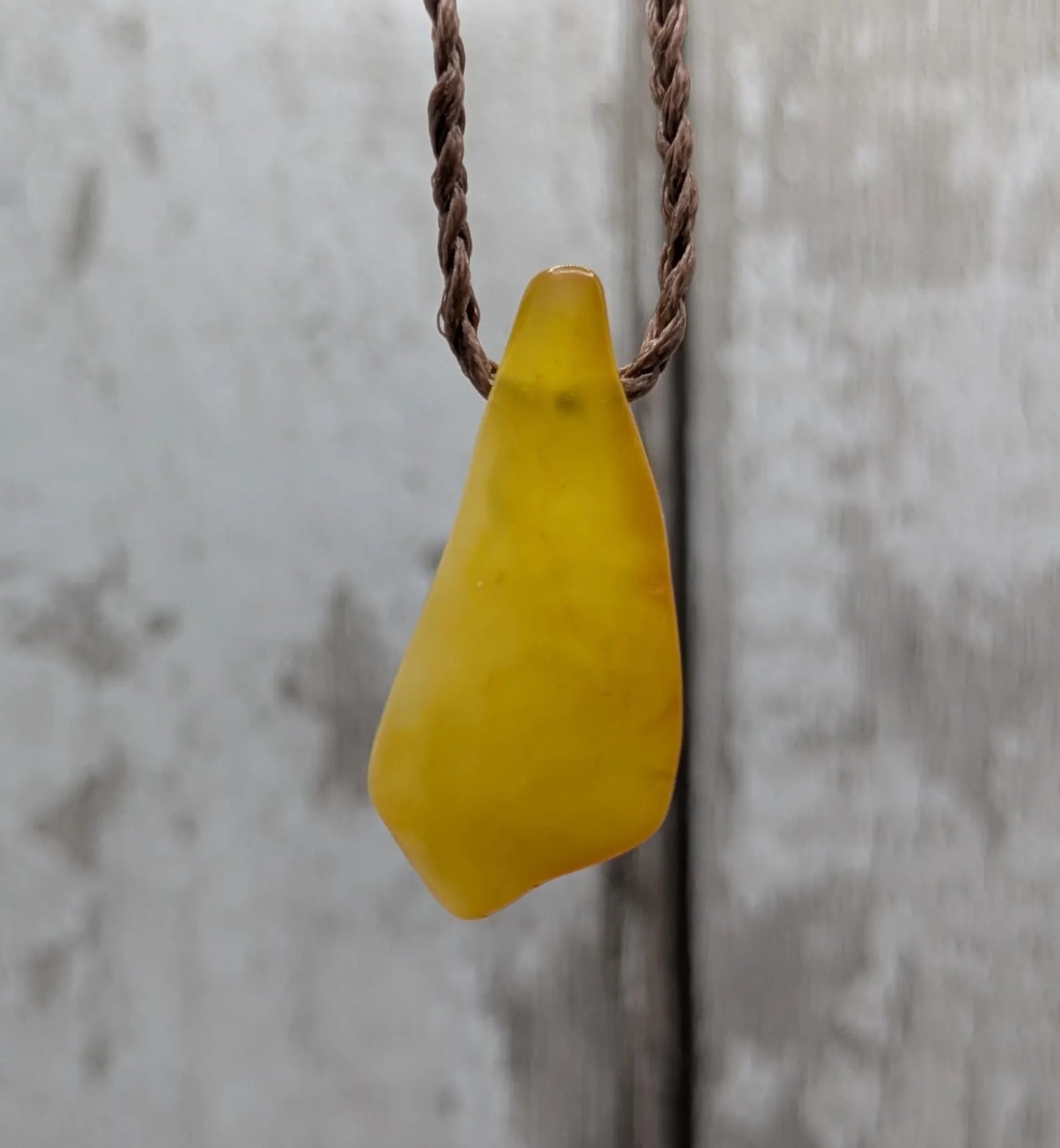 Tumble polished baltic Amber pendant.