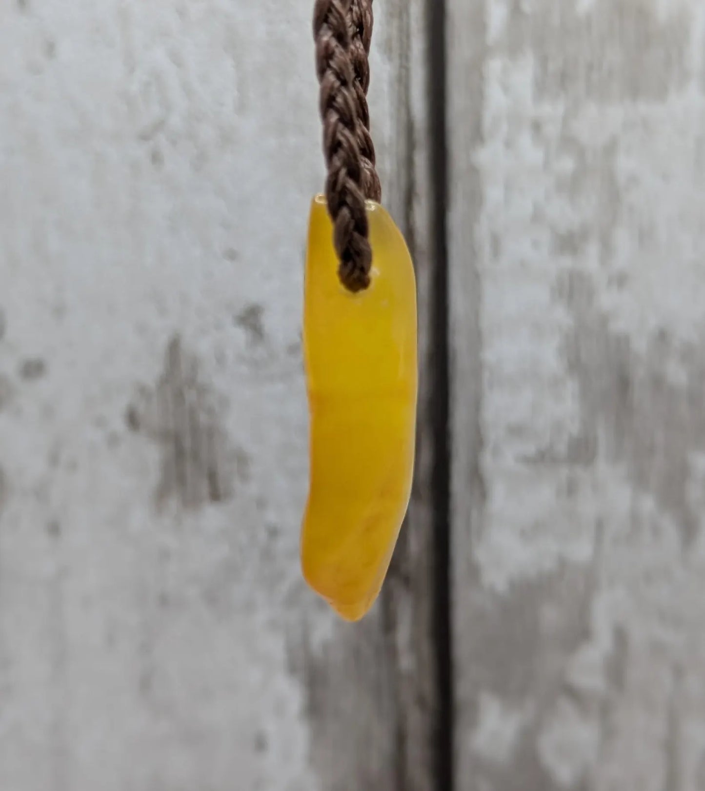 Tumble polished baltic Amber pendant.