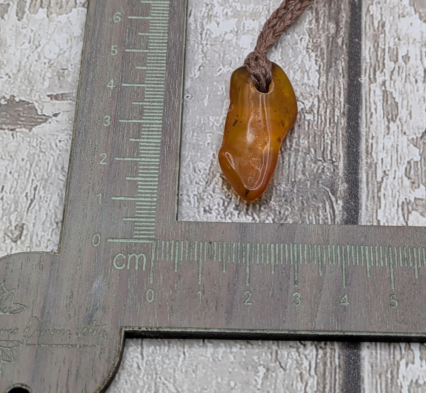 Tumble polished baltic Amber pendant.