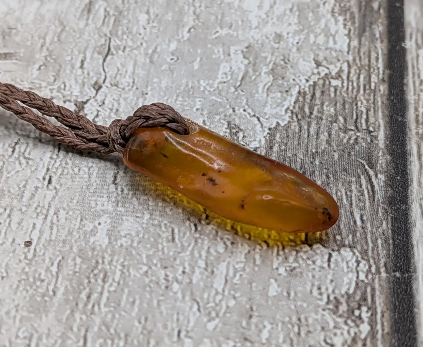 Tumble polished baltic Amber pendant.