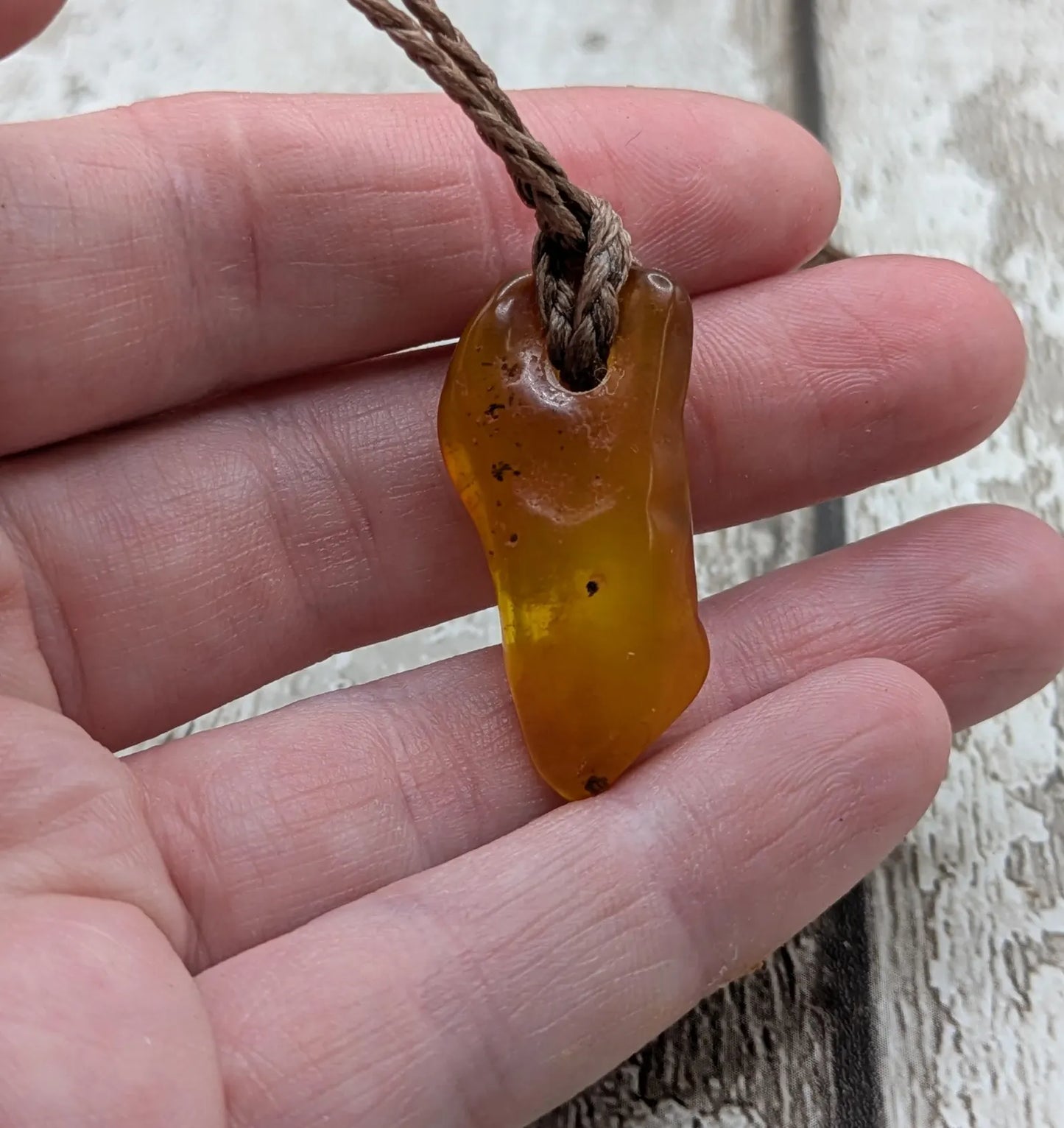 Tumble polished baltic Amber pendant.