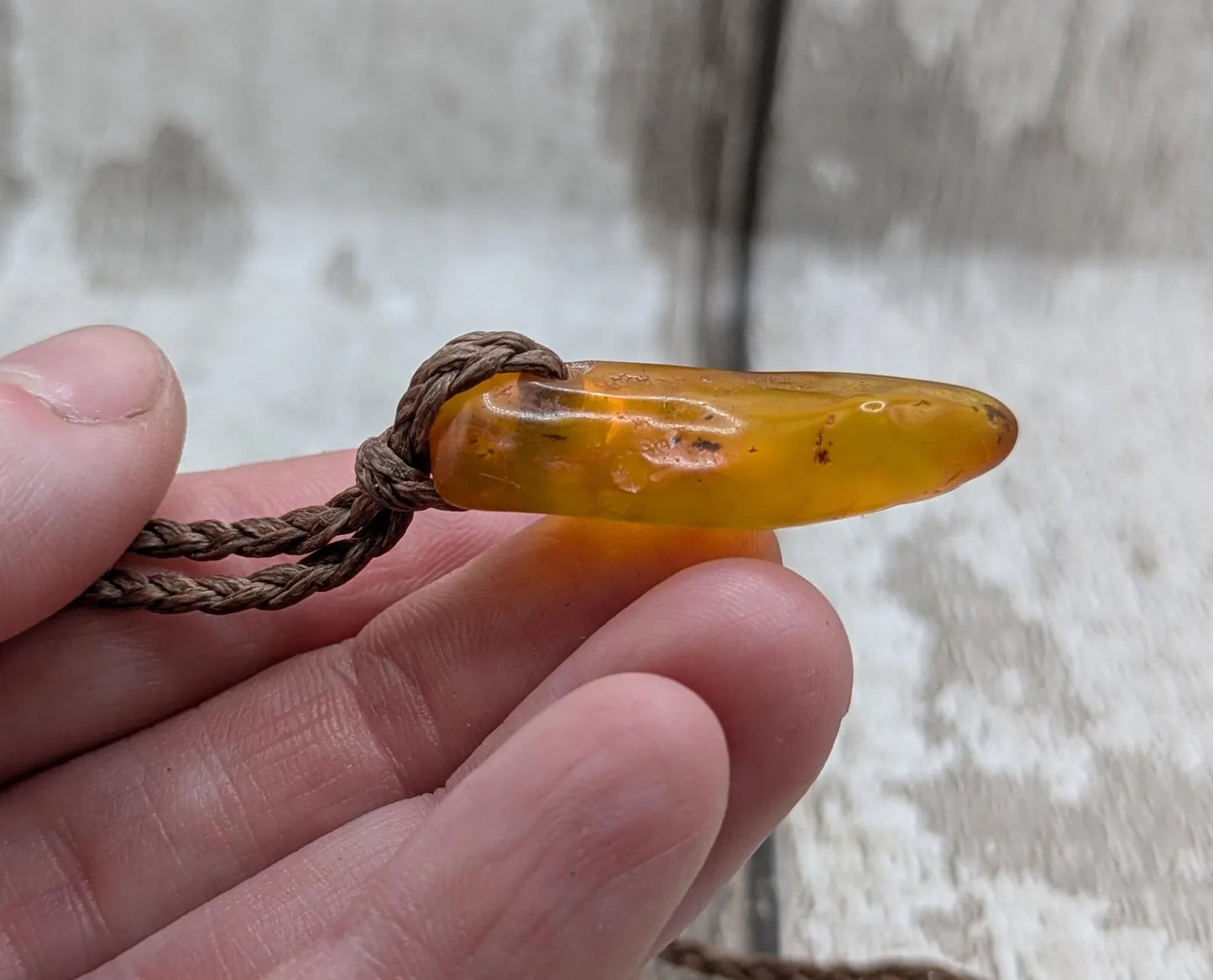 Tumble polished baltic Amber pendant.
