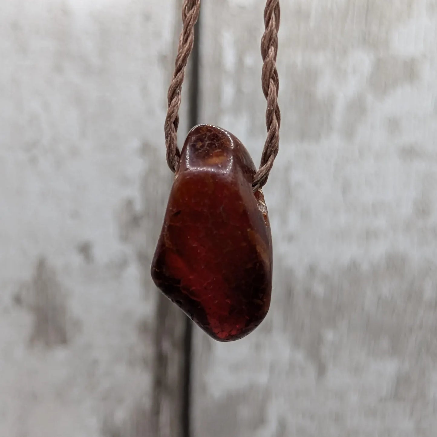 Tumble polished baltic Amber pendant.