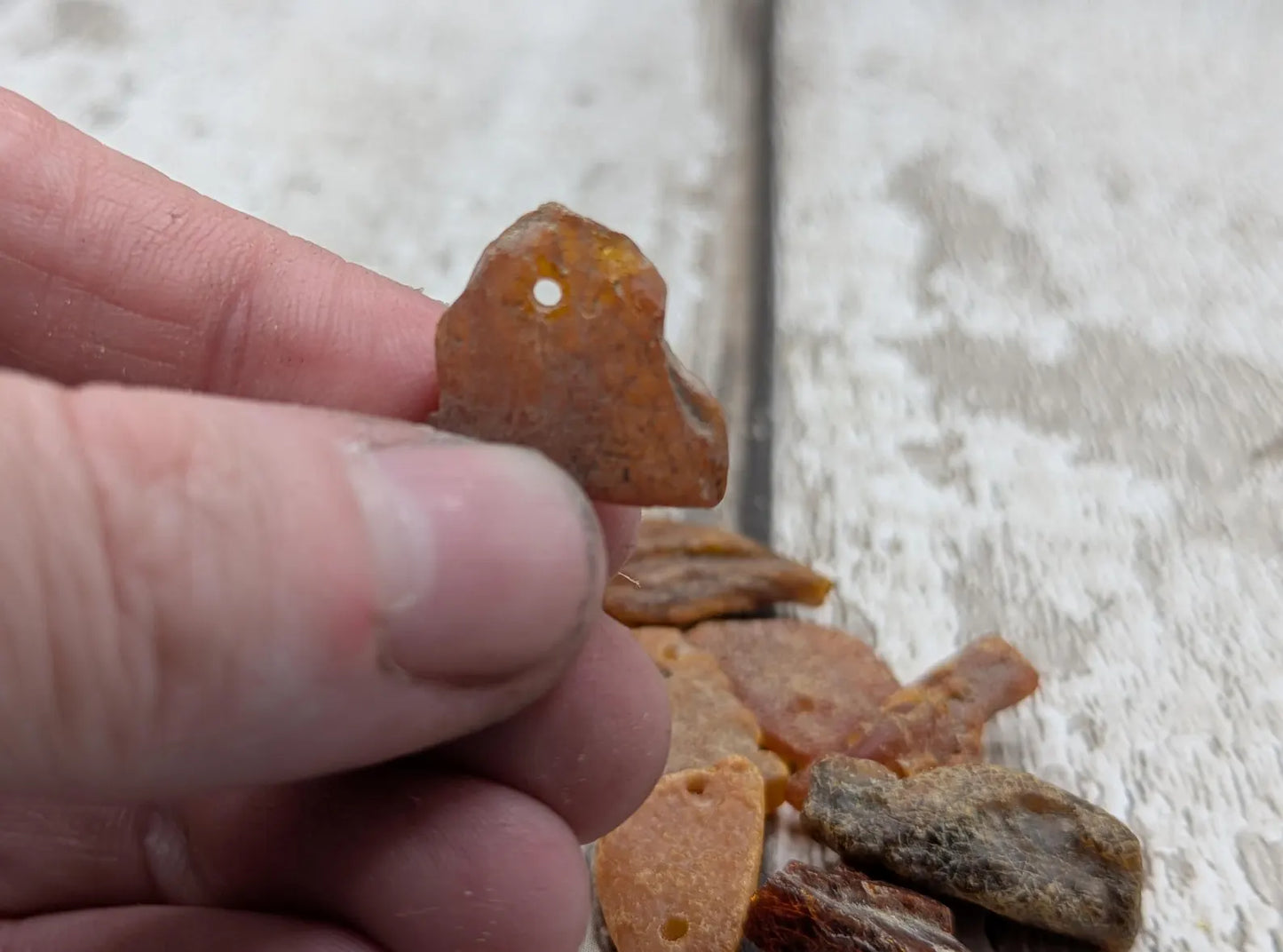 Raw natural top drilled Baltic Amber beads.