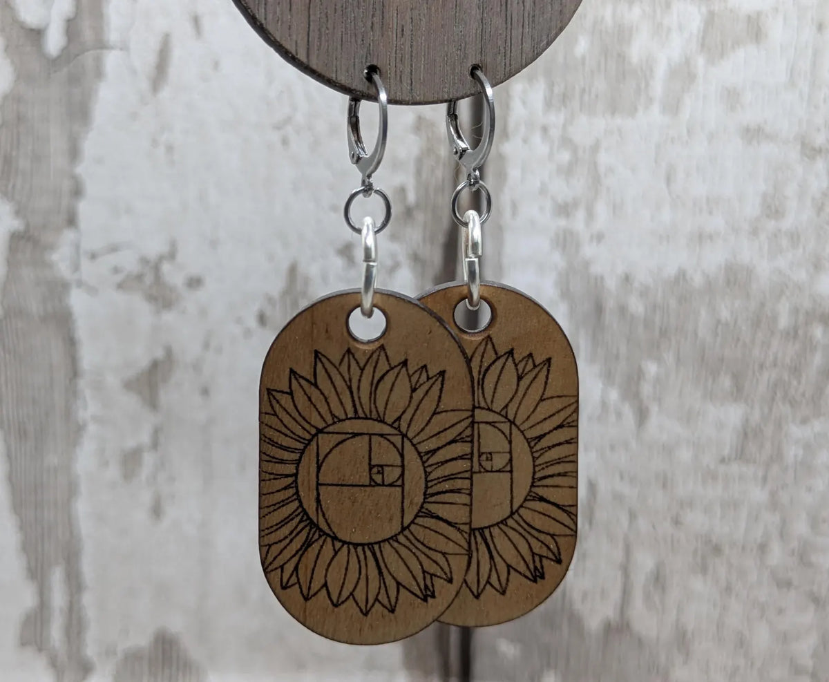 Lime wood sunflower Fibonacci hoop earrings.