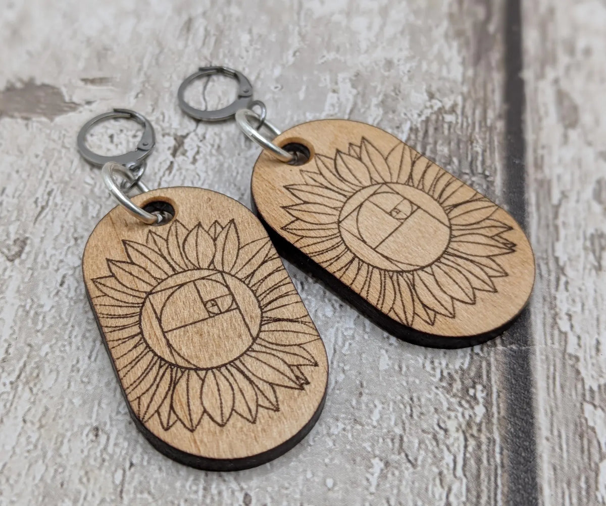 Lime wood sunflower Fibonacci hoop earrings.