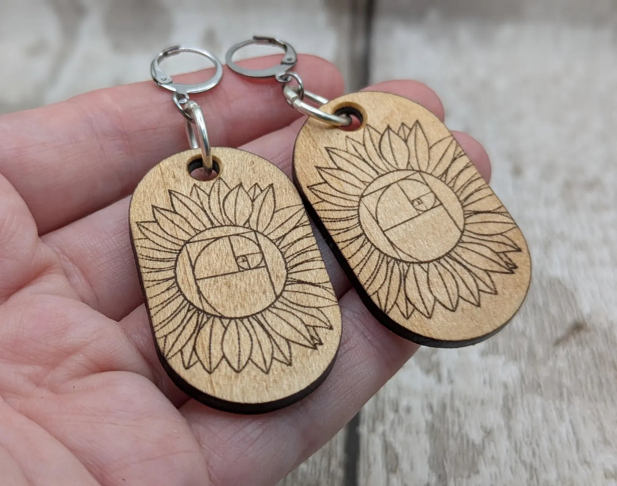 Lime wood sunflower Fibonacci hoop earrings.