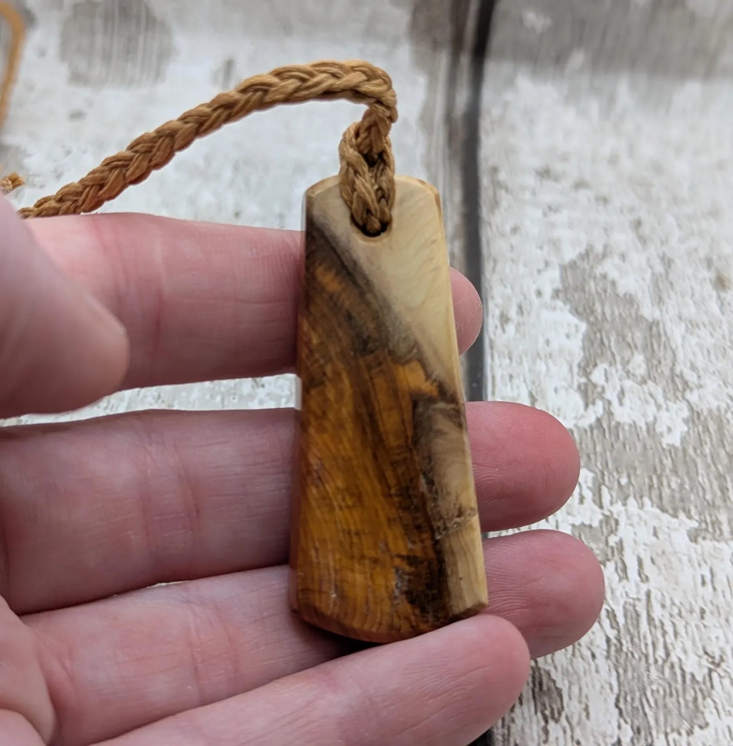 Yew wood laser printed all over ammonite print pendant.