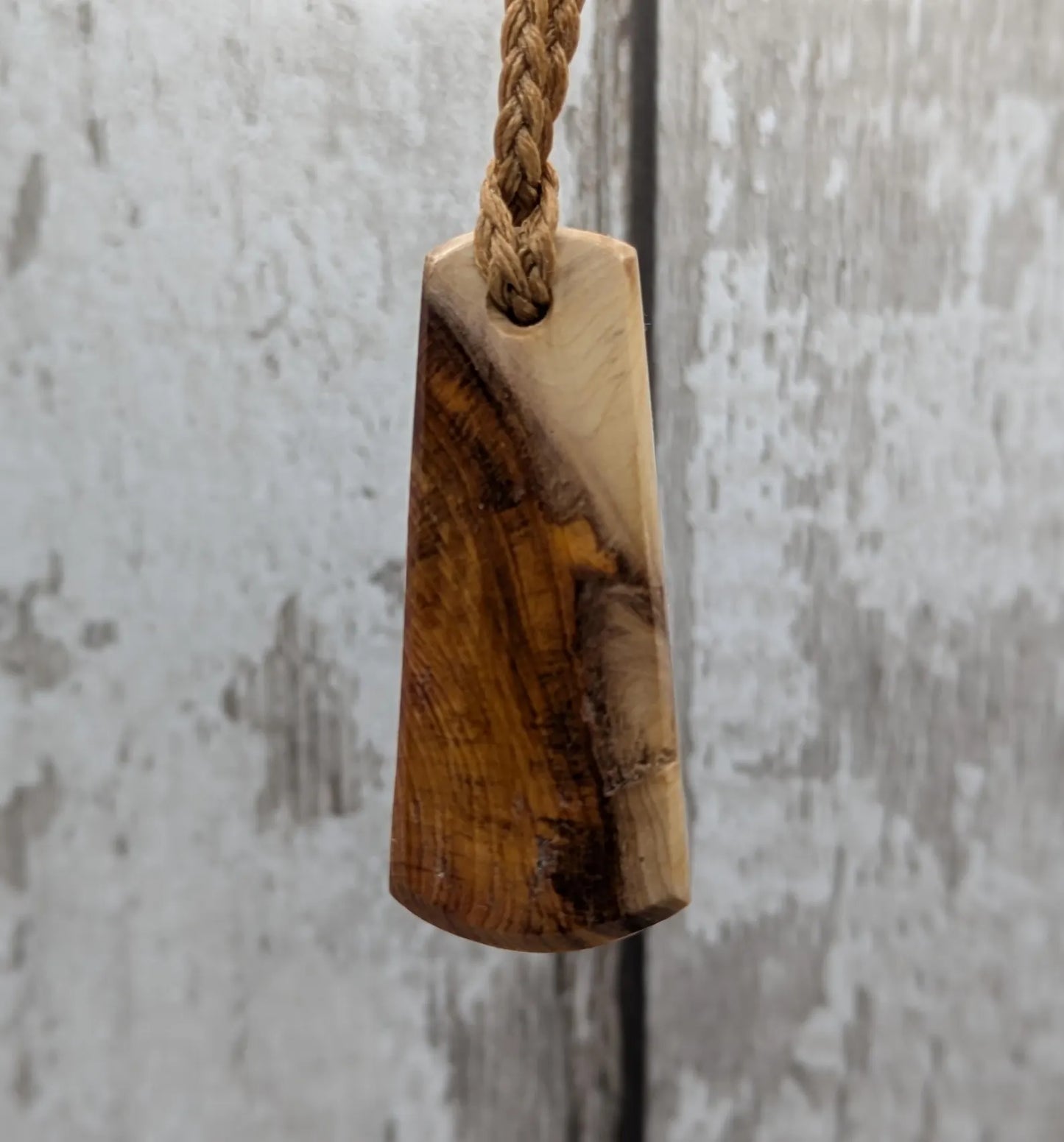 Yew wood laser printed all over ammonite print pendant.