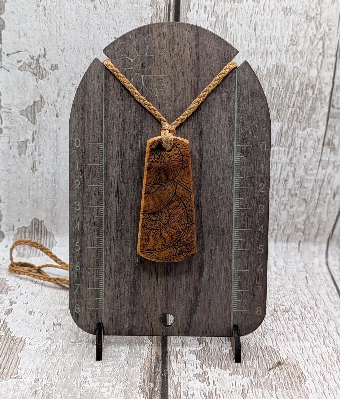 Laser printed all over ammonite on yew wood Pendant.