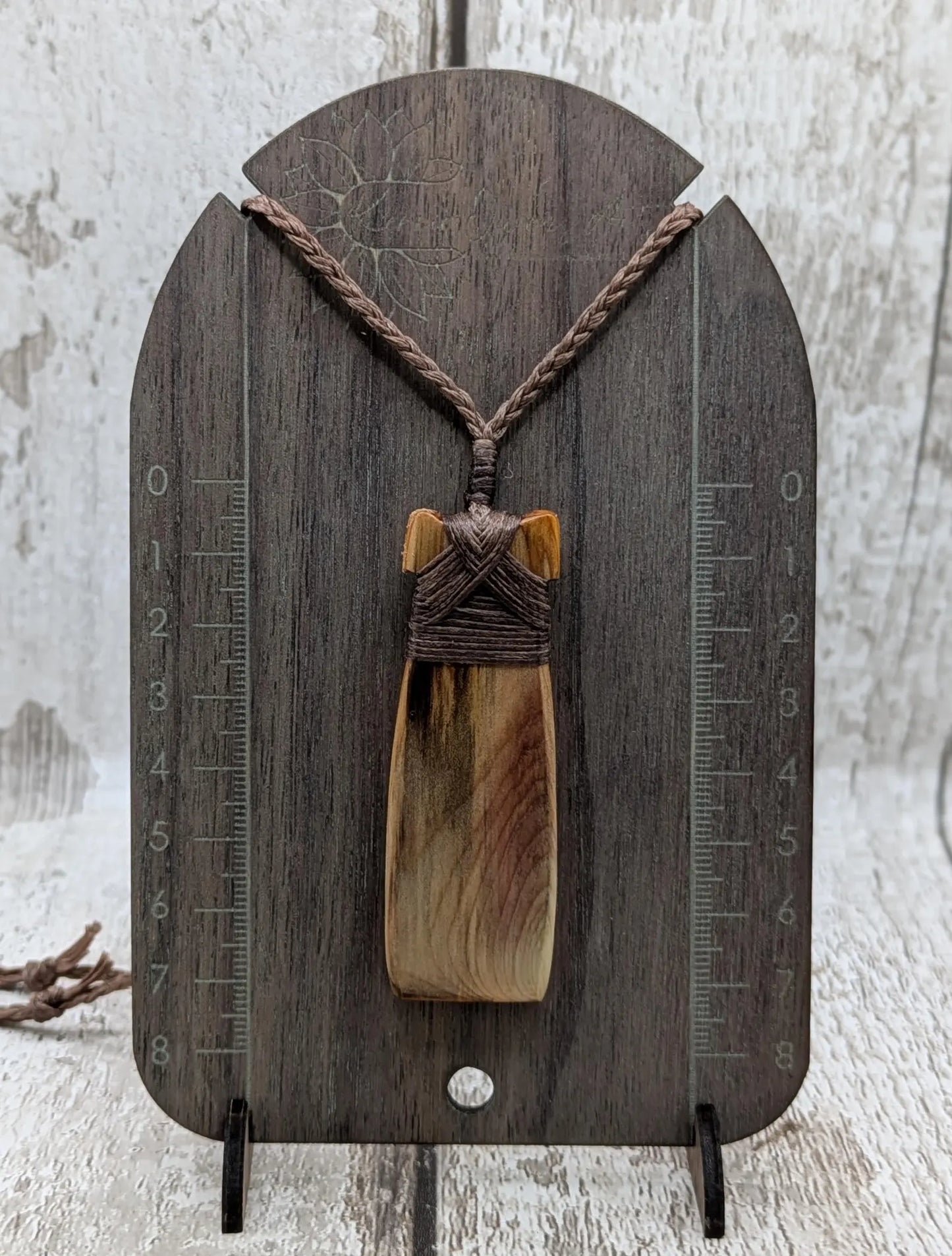Spalted yew wood Hei Toki adze pendant.