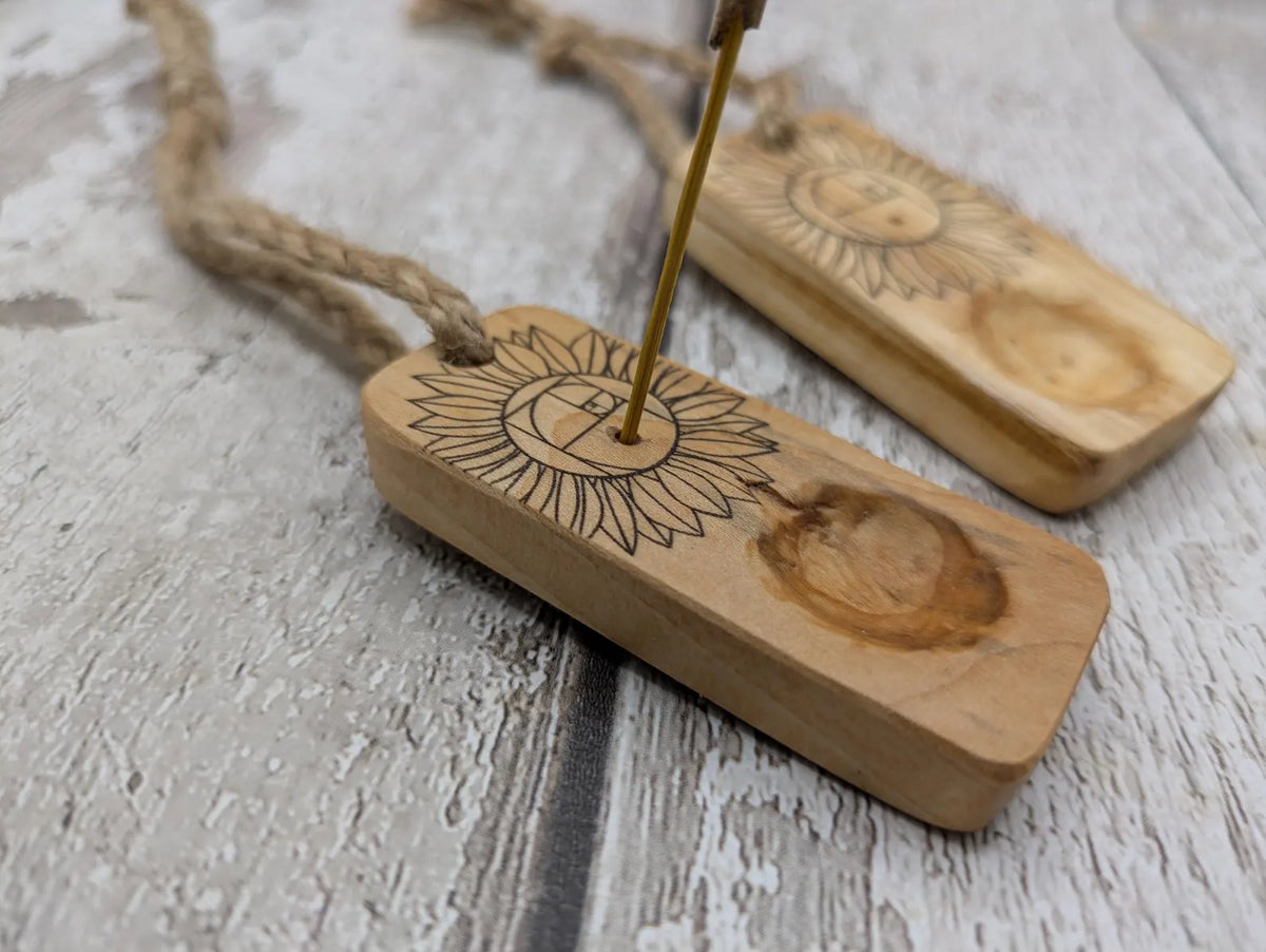 Sunflower Fibonacci travel sized wooden incense holder.