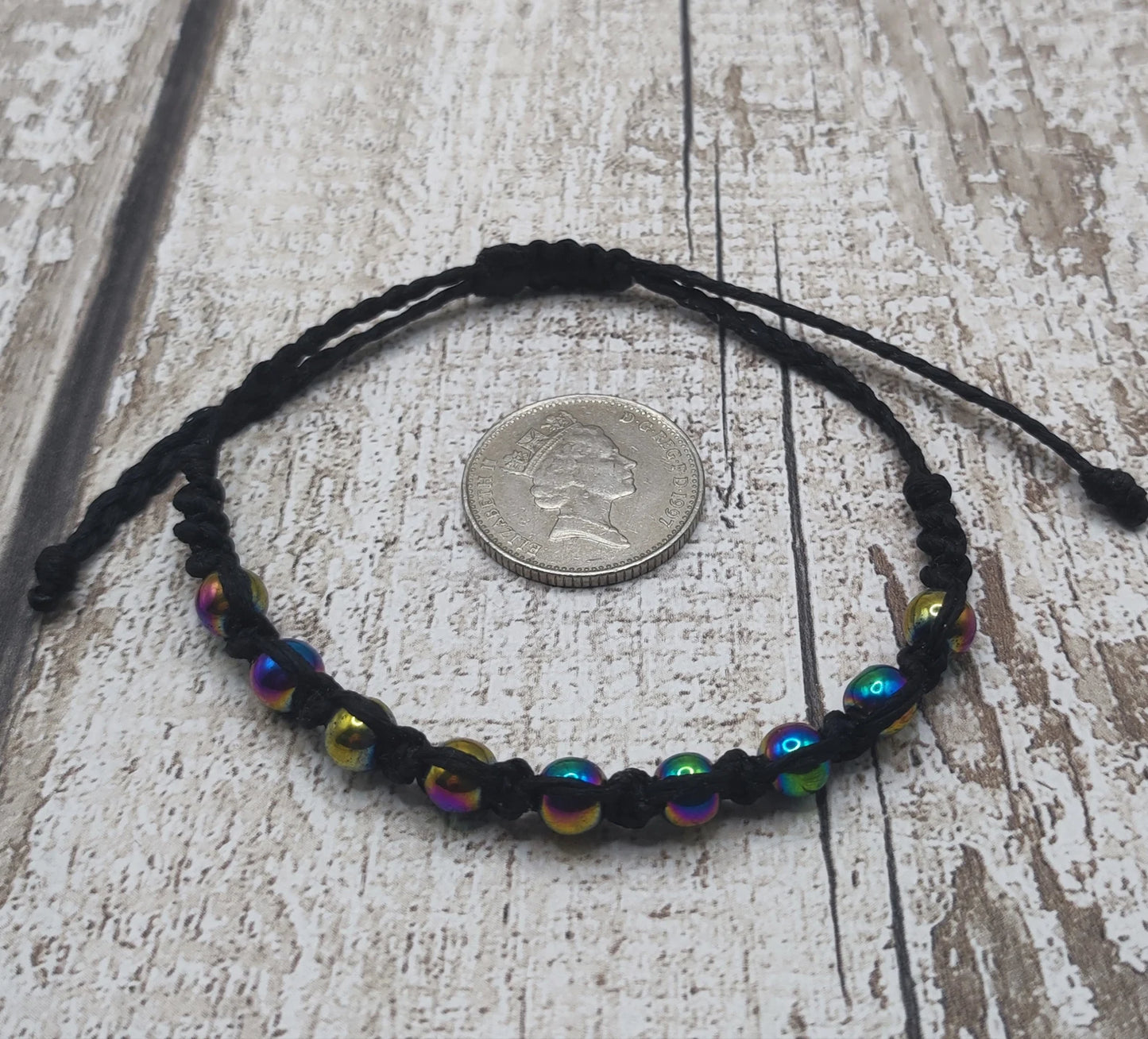 Titanium plated Magnetic hematite adjustable macramè bracelet.