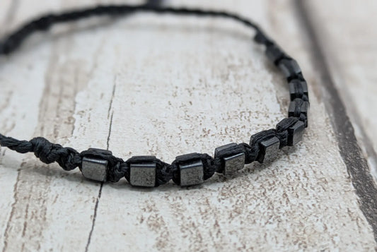 Square hematite beaded macrame bracelet.