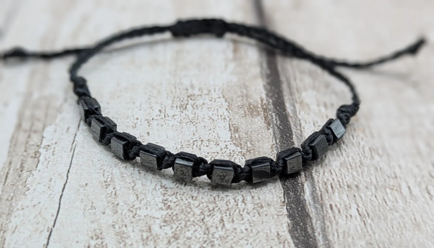 Square hematite beaded macrame bracelet.