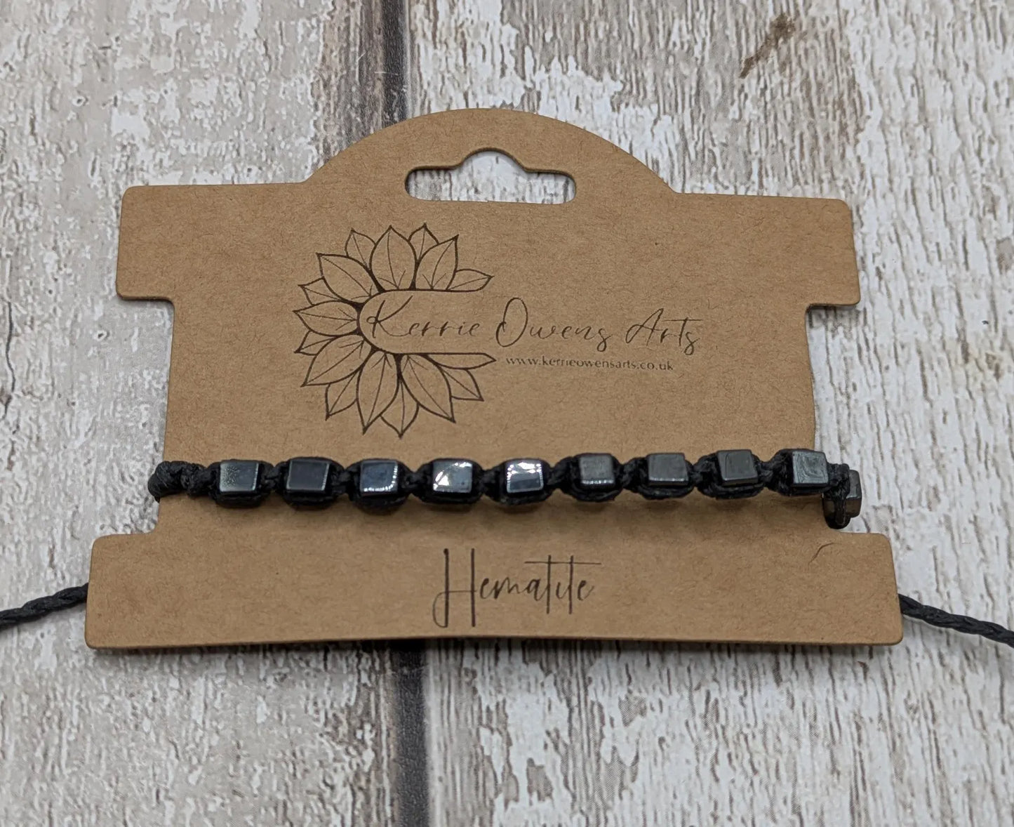Square hematite beaded macrame bracelet.