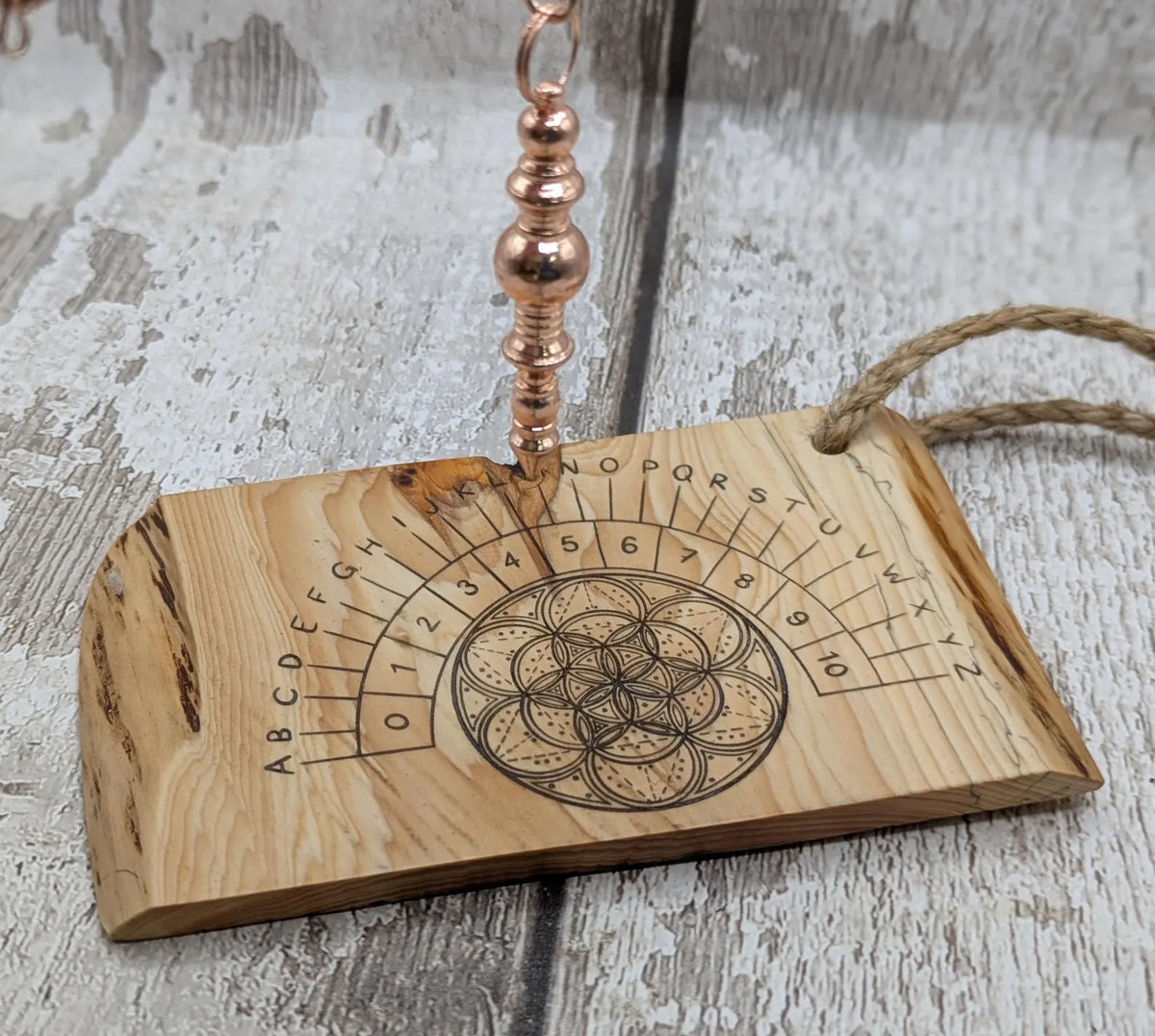 Lace wood mini pocket sized pendulum dowsing board.
