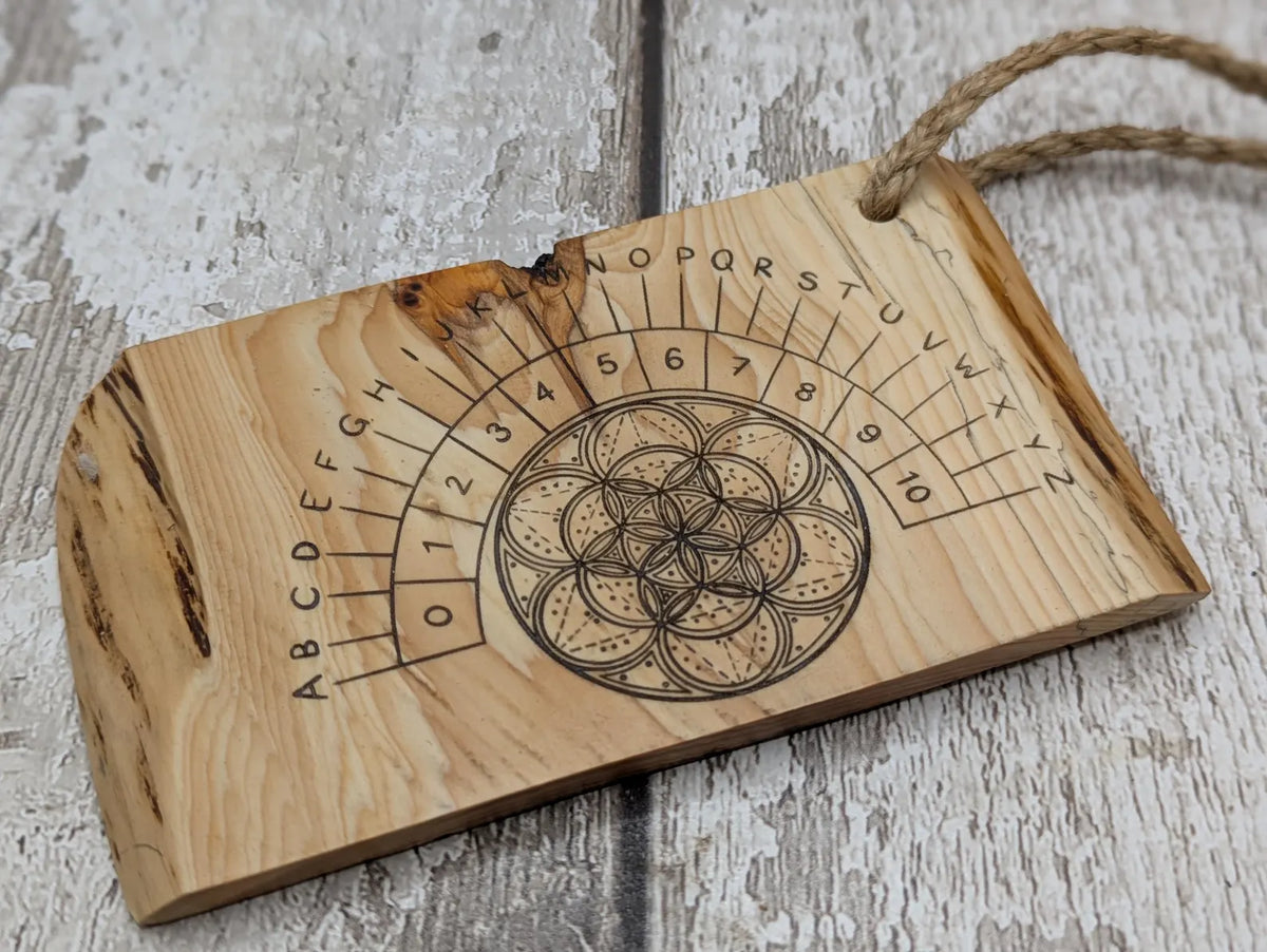 Lace wood mini pocket sized pendulum dowsing board.