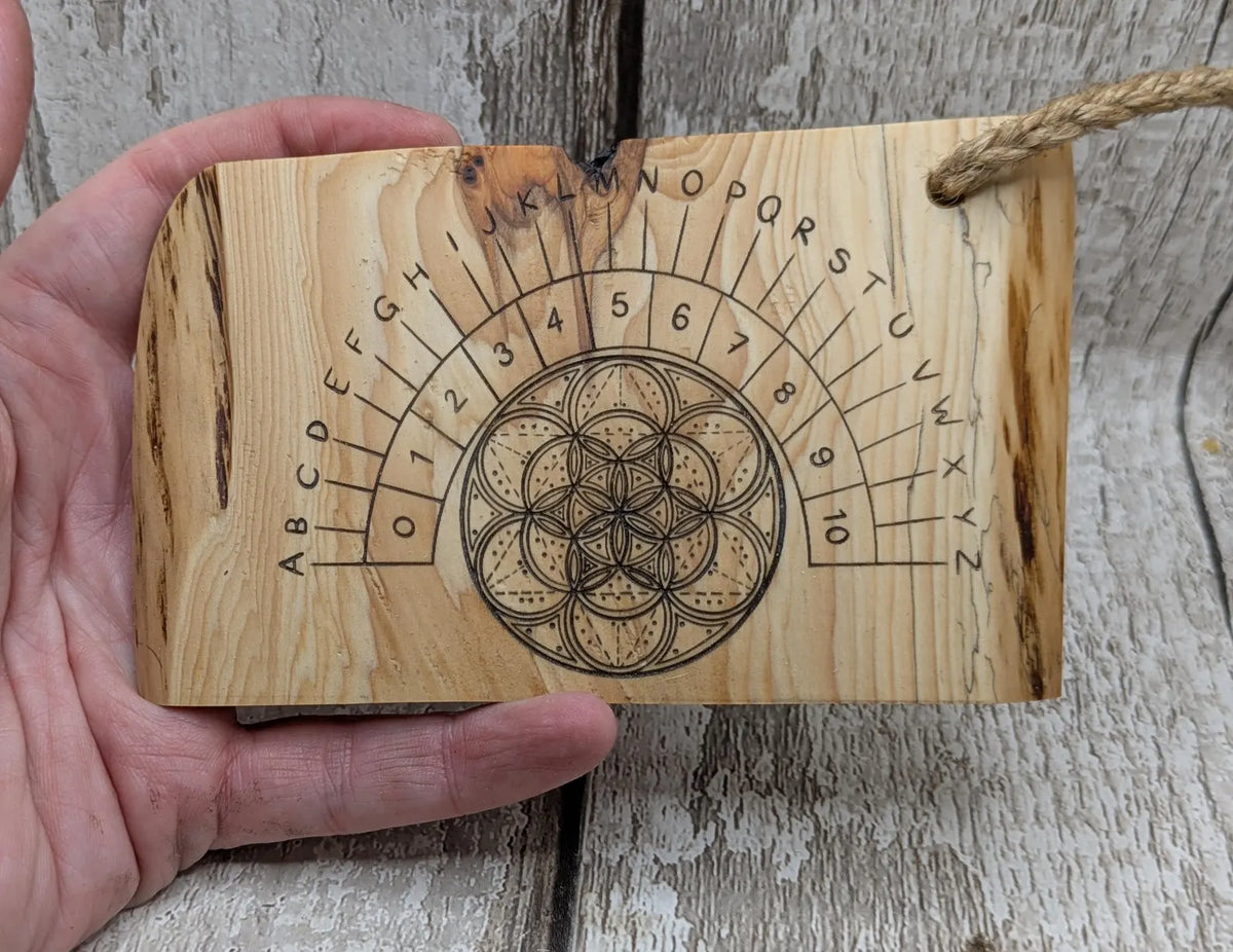 Lace wood mini pocket sized pendulum dowsing board.