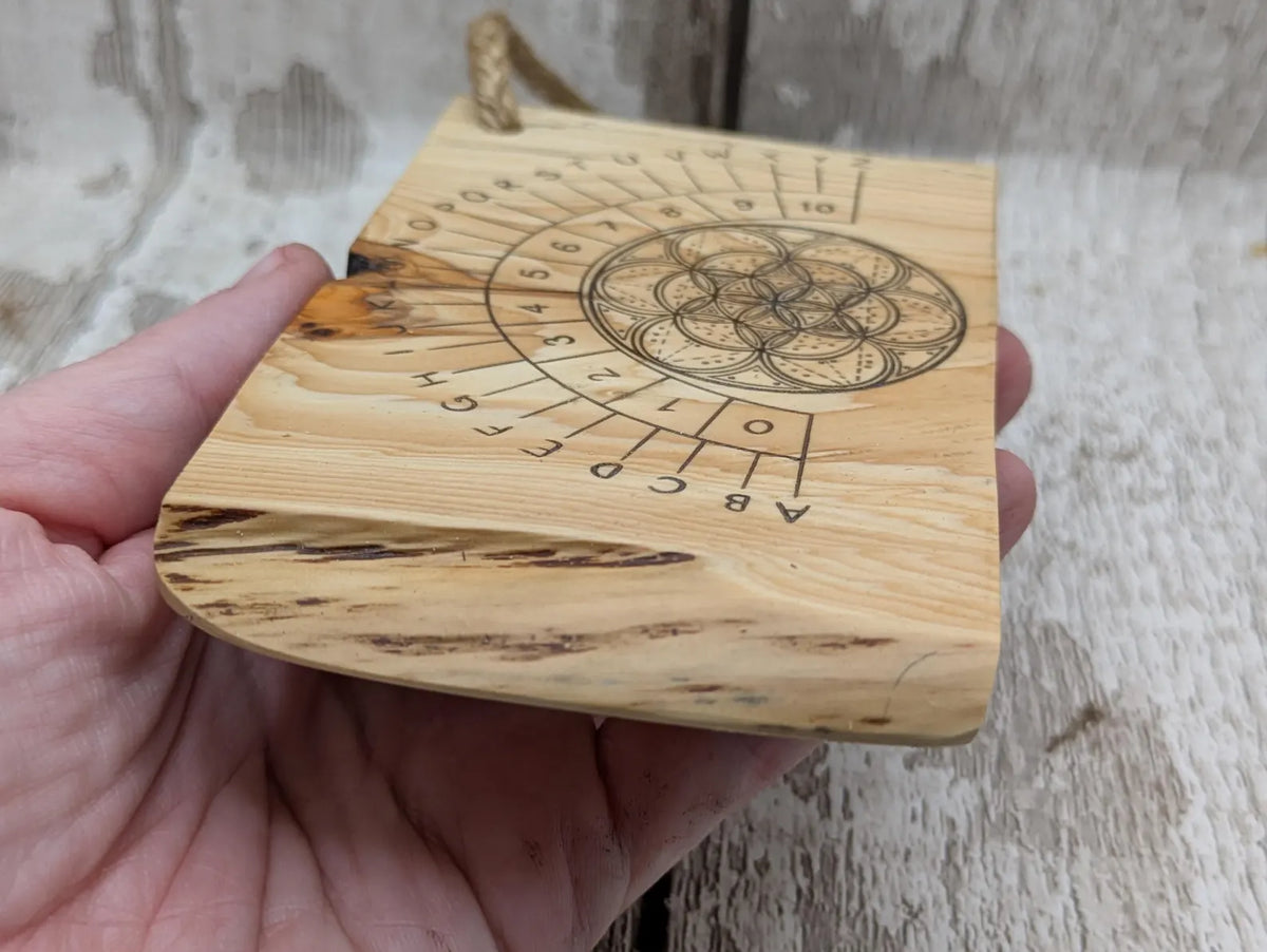 Lace wood mini pocket sized pendulum dowsing board.