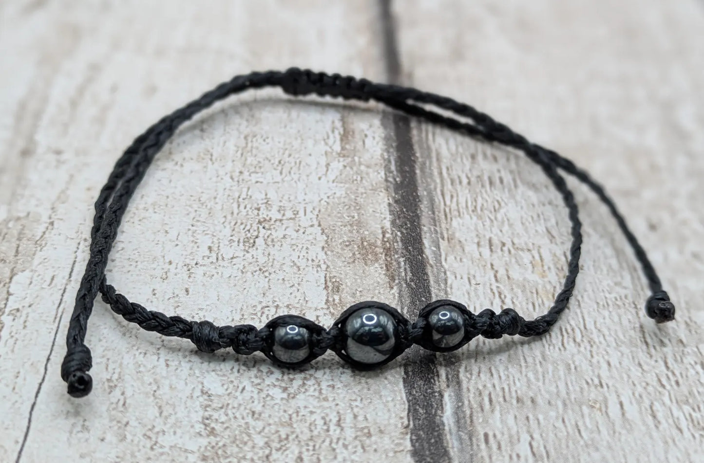 Hematite beaded macrame woven bracelet.