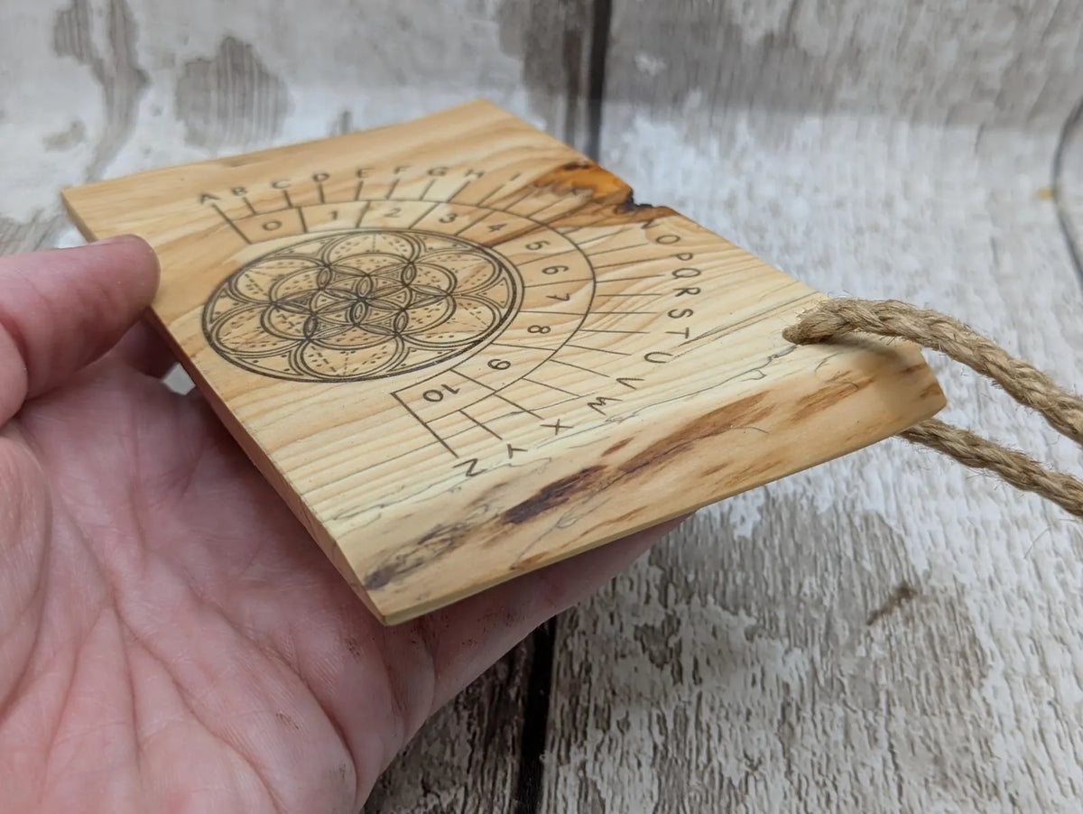 Lace wood mini pocket sized pendulum dowsing board.