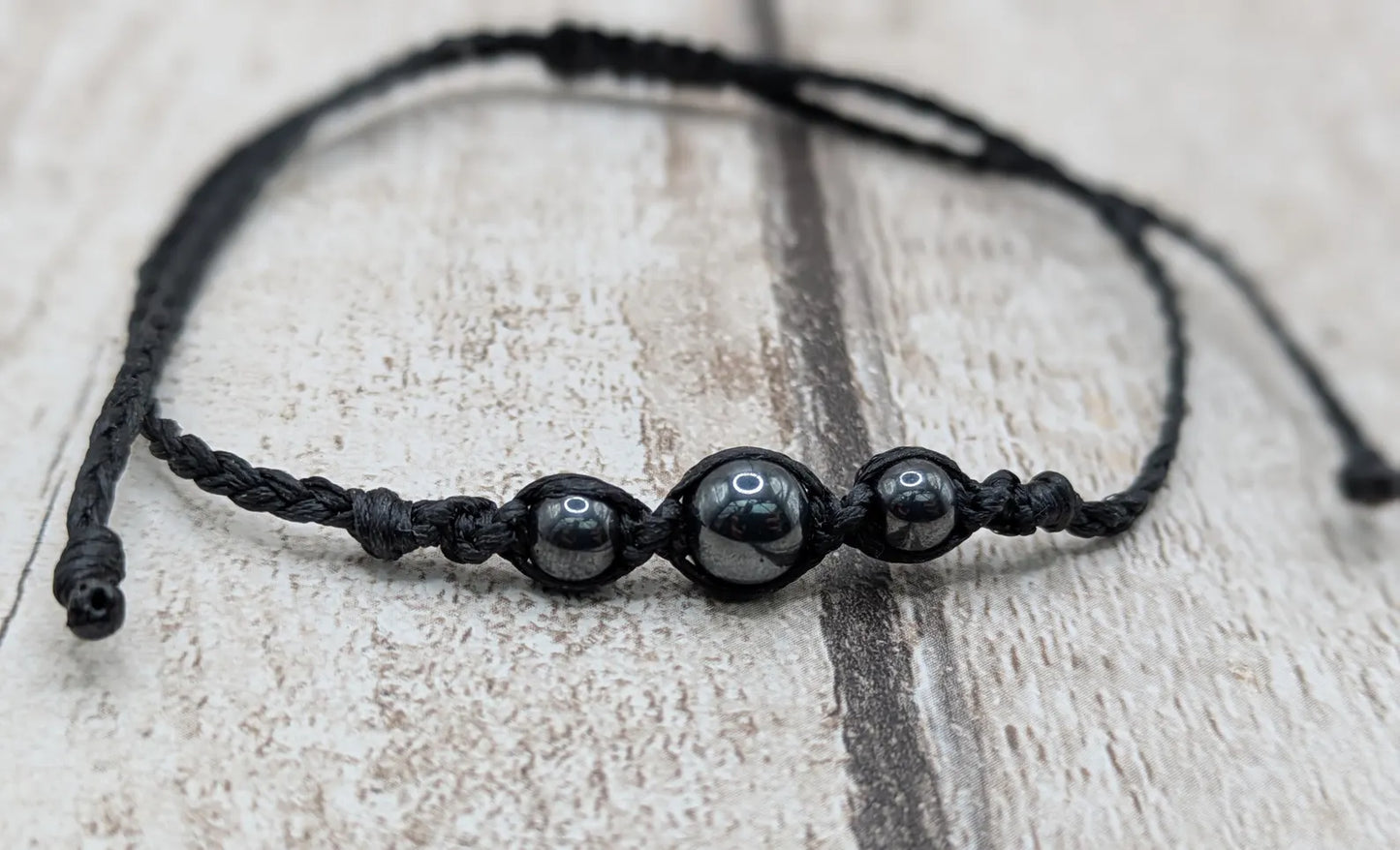 Hematite beaded macrame woven bracelet.