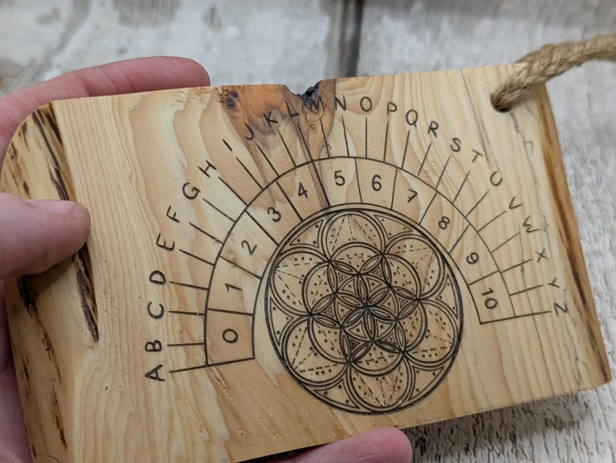 Lace wood mini pocket sized pendulum dowsing board.