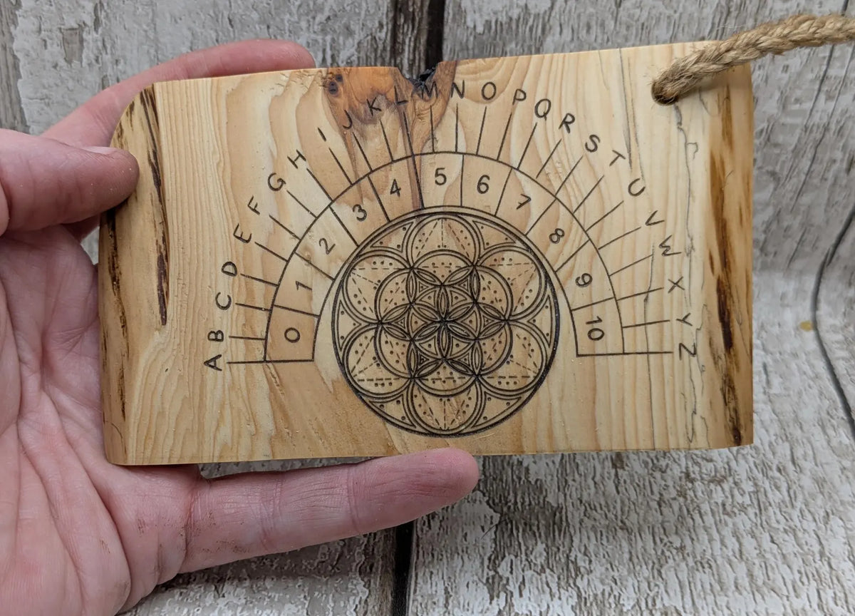 Lace wood mini pocket sized pendulum dowsing board.