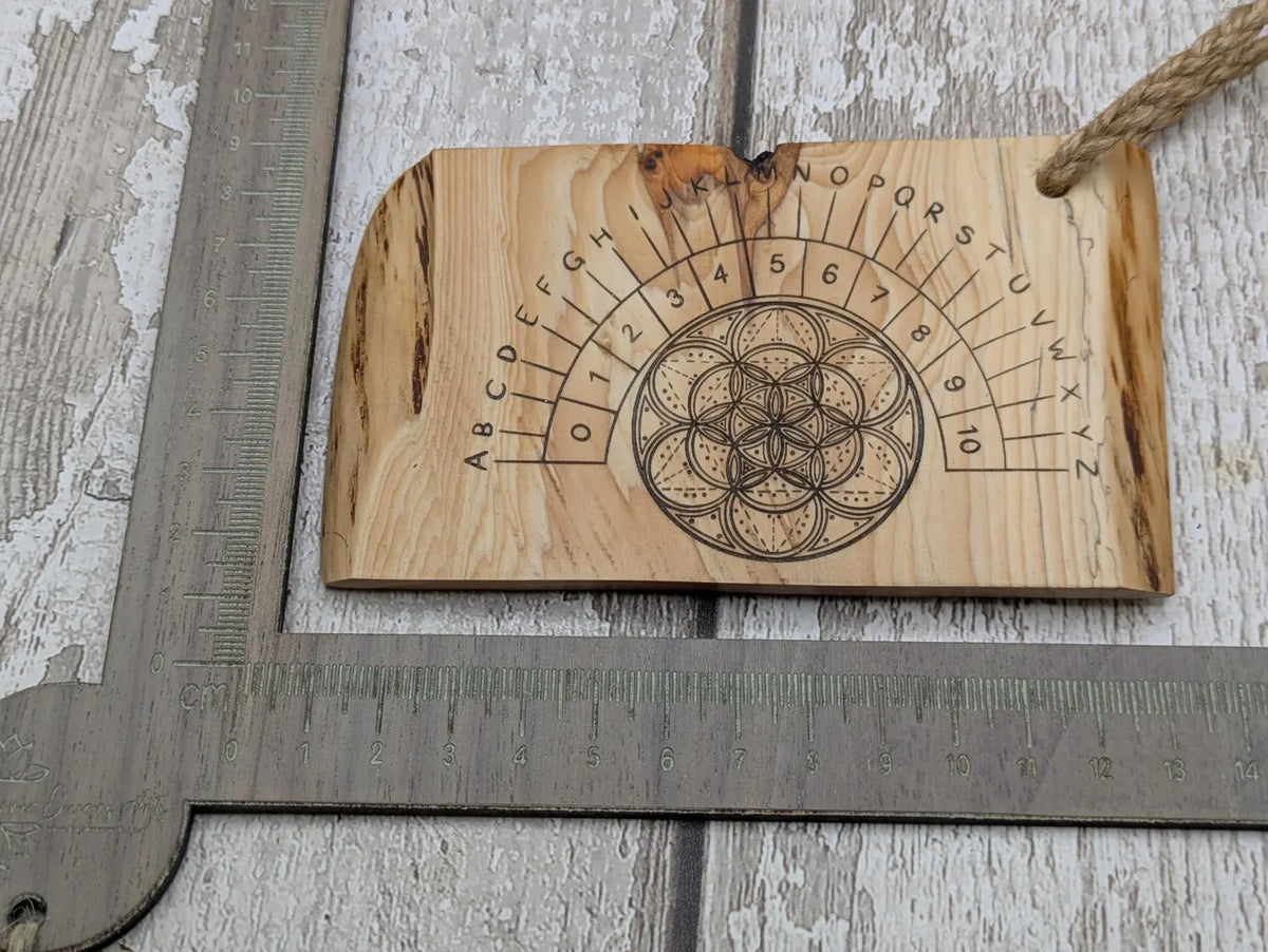 Lace wood mini pocket sized pendulum dowsing board.