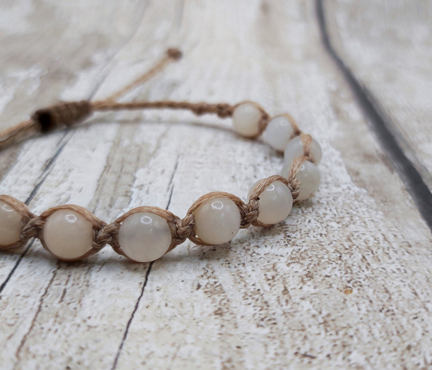 Peach adventurine beaded macrame woven bracelet.