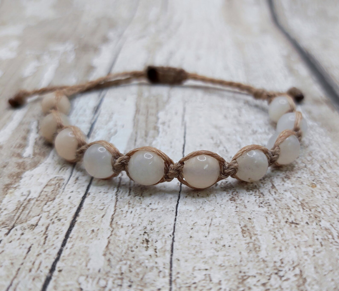 Peach adventurine beaded macrame woven bracelet.