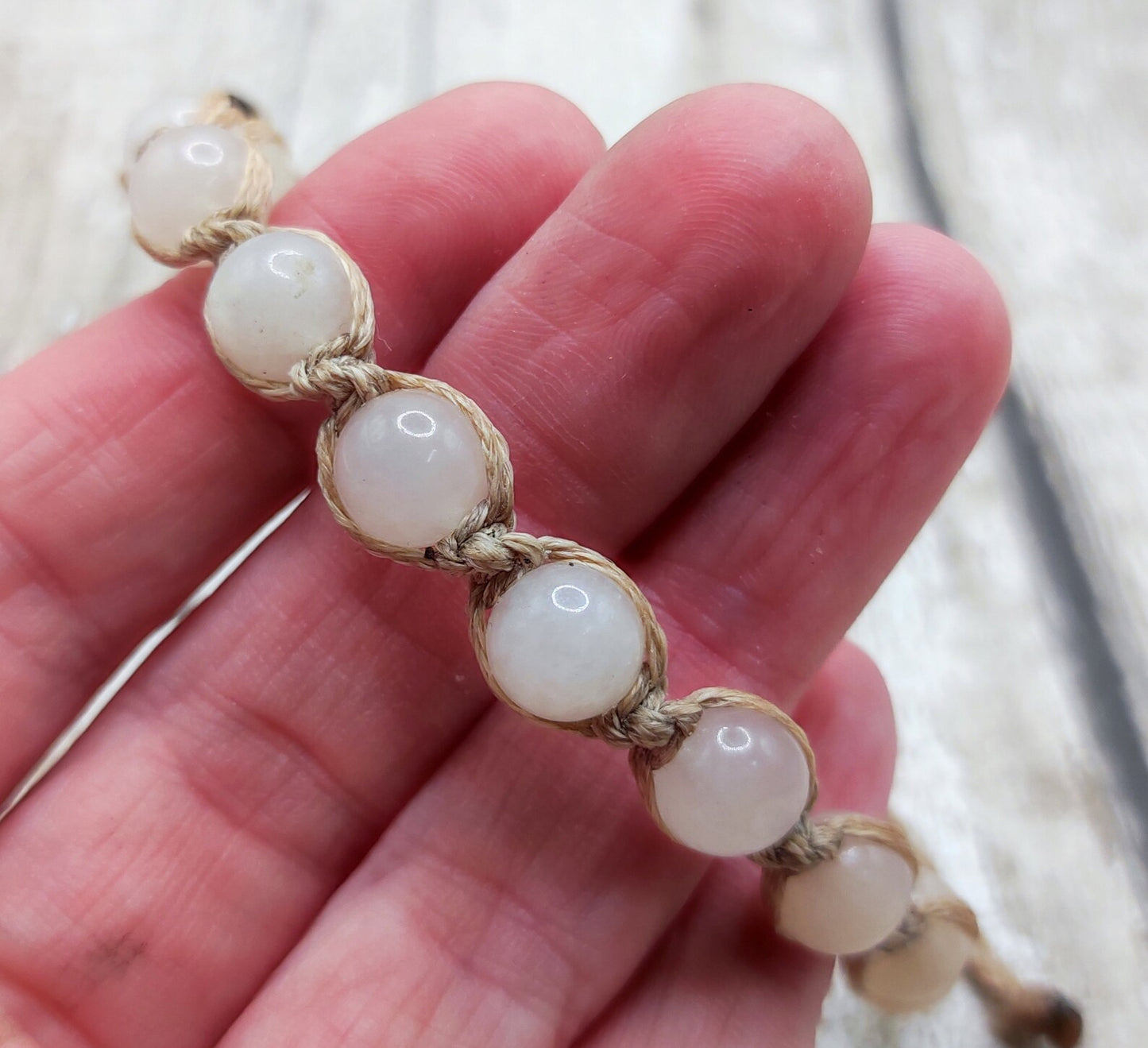 Peach adventurine beaded macrame woven bracelet.
