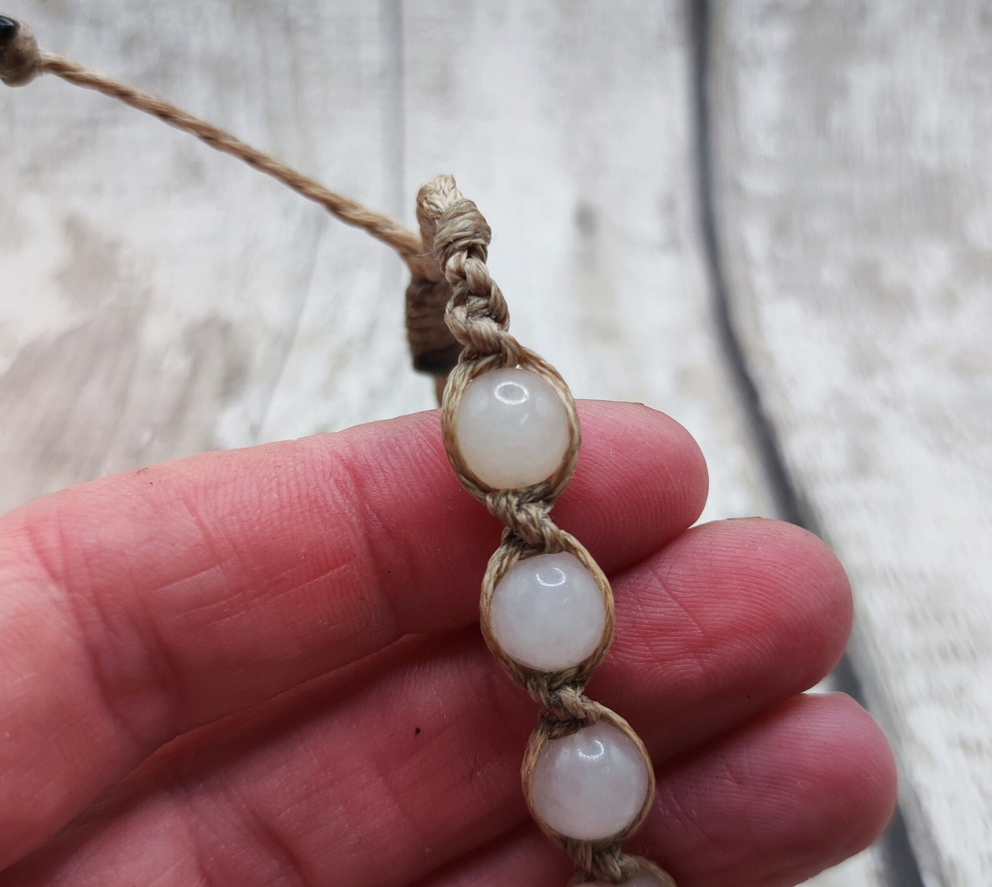 Peach adventurine beaded macrame woven bracelet.