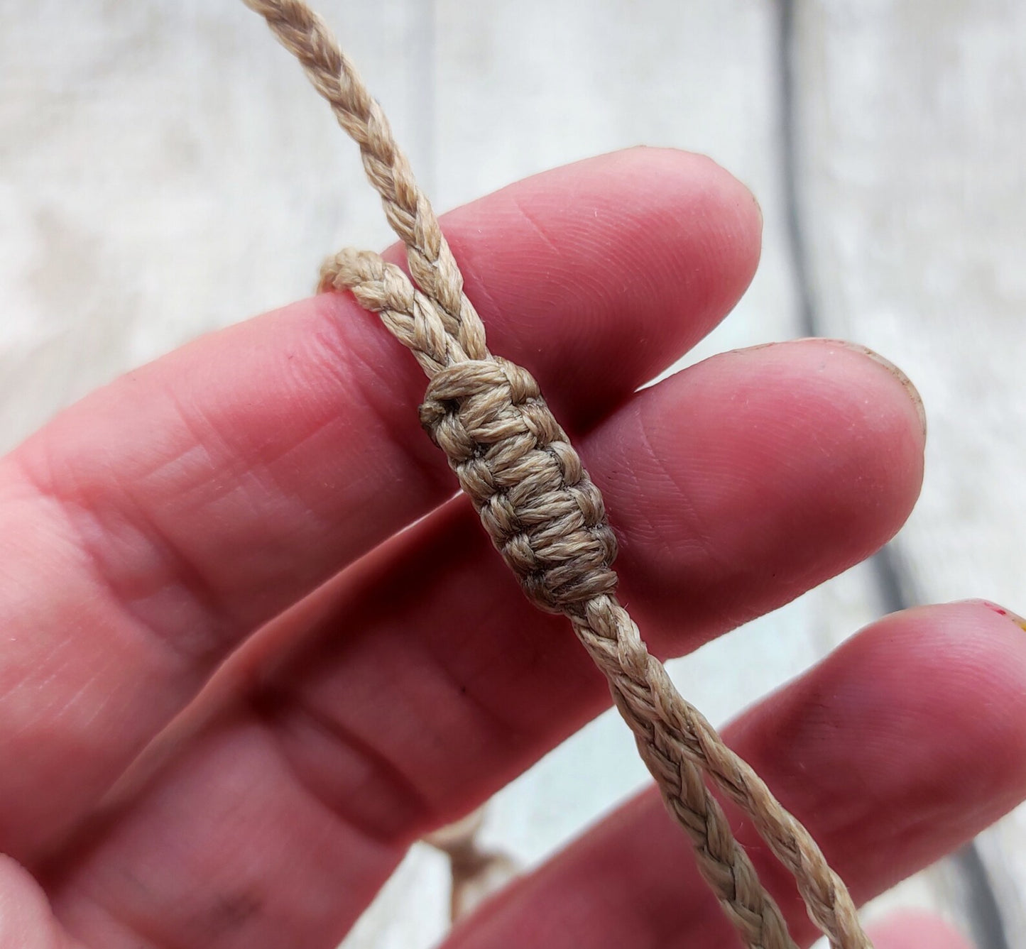 Peach adventurine beaded macrame woven bracelet.