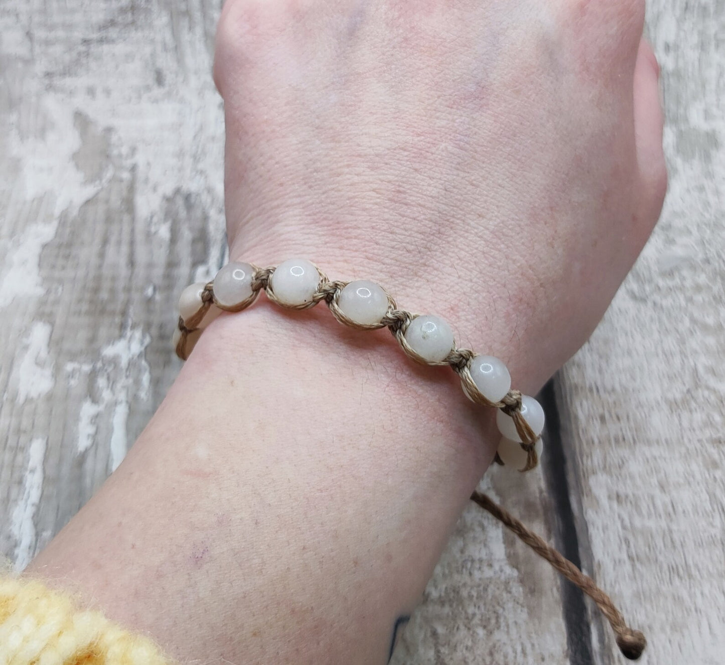 Peach adventurine beaded macrame woven bracelet.