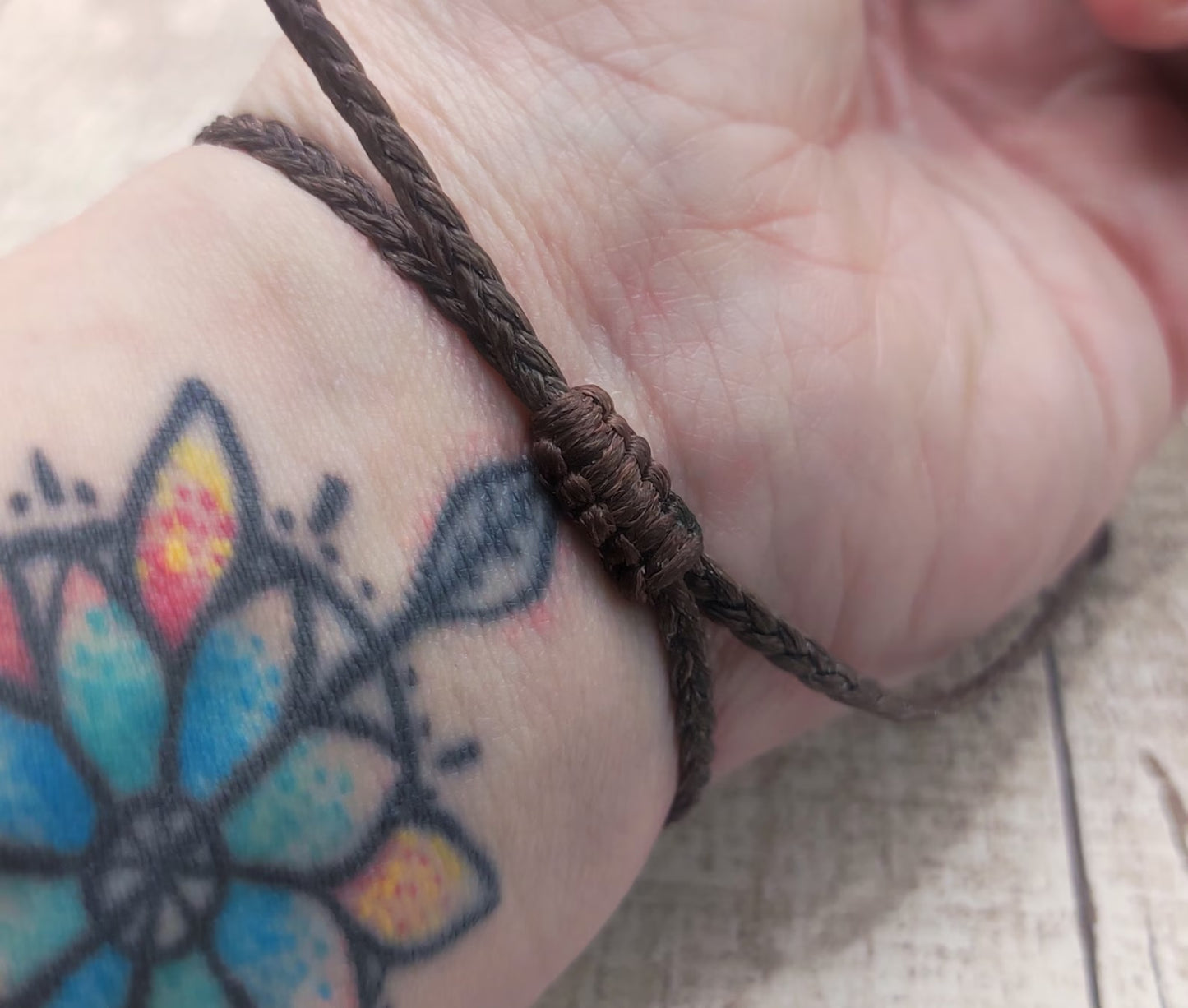 Rhodochrosite macrame woven adjustable bracelet.