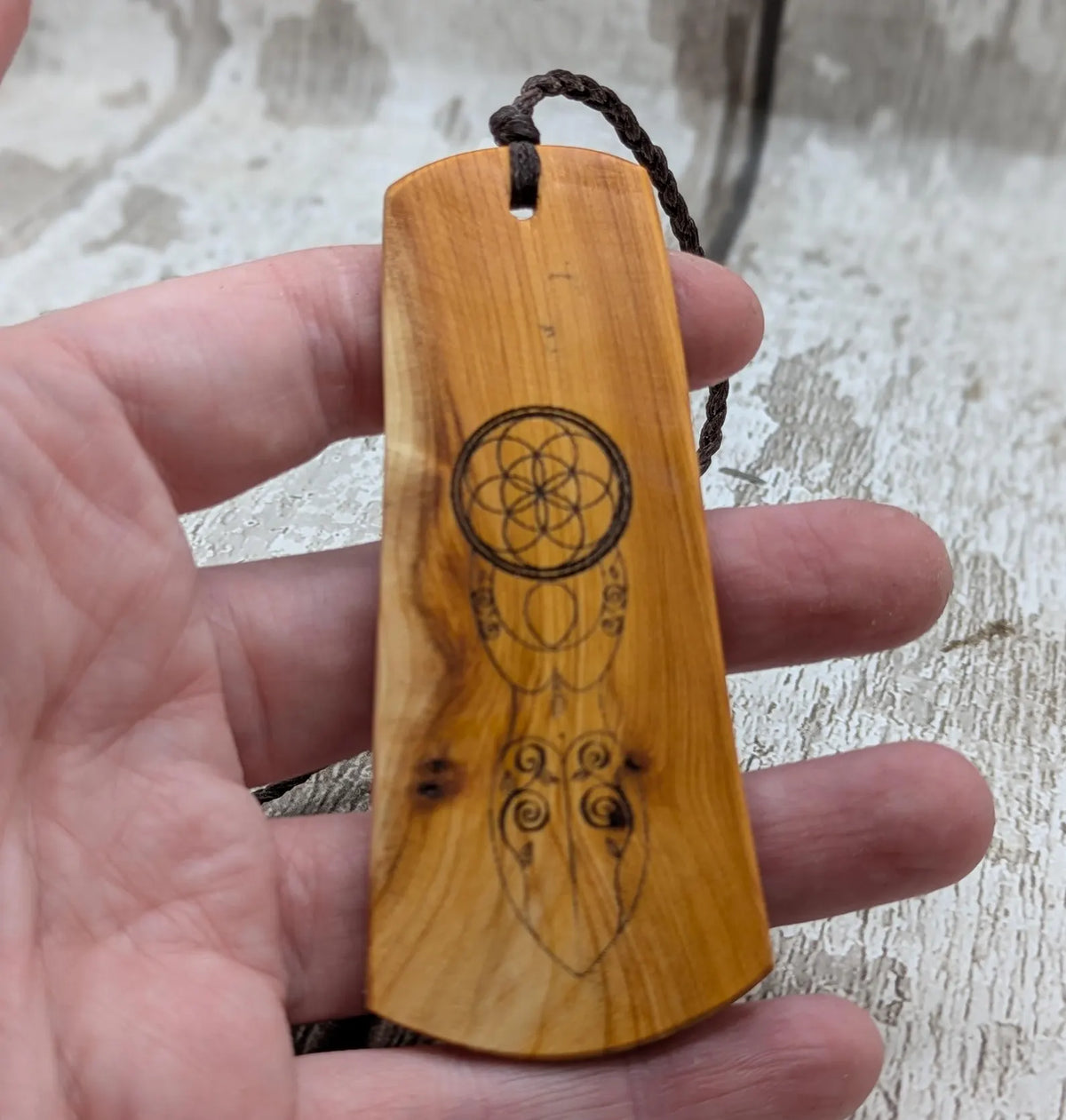 Yew wood, goddess print bookmark with pāua abalone bead tassel.