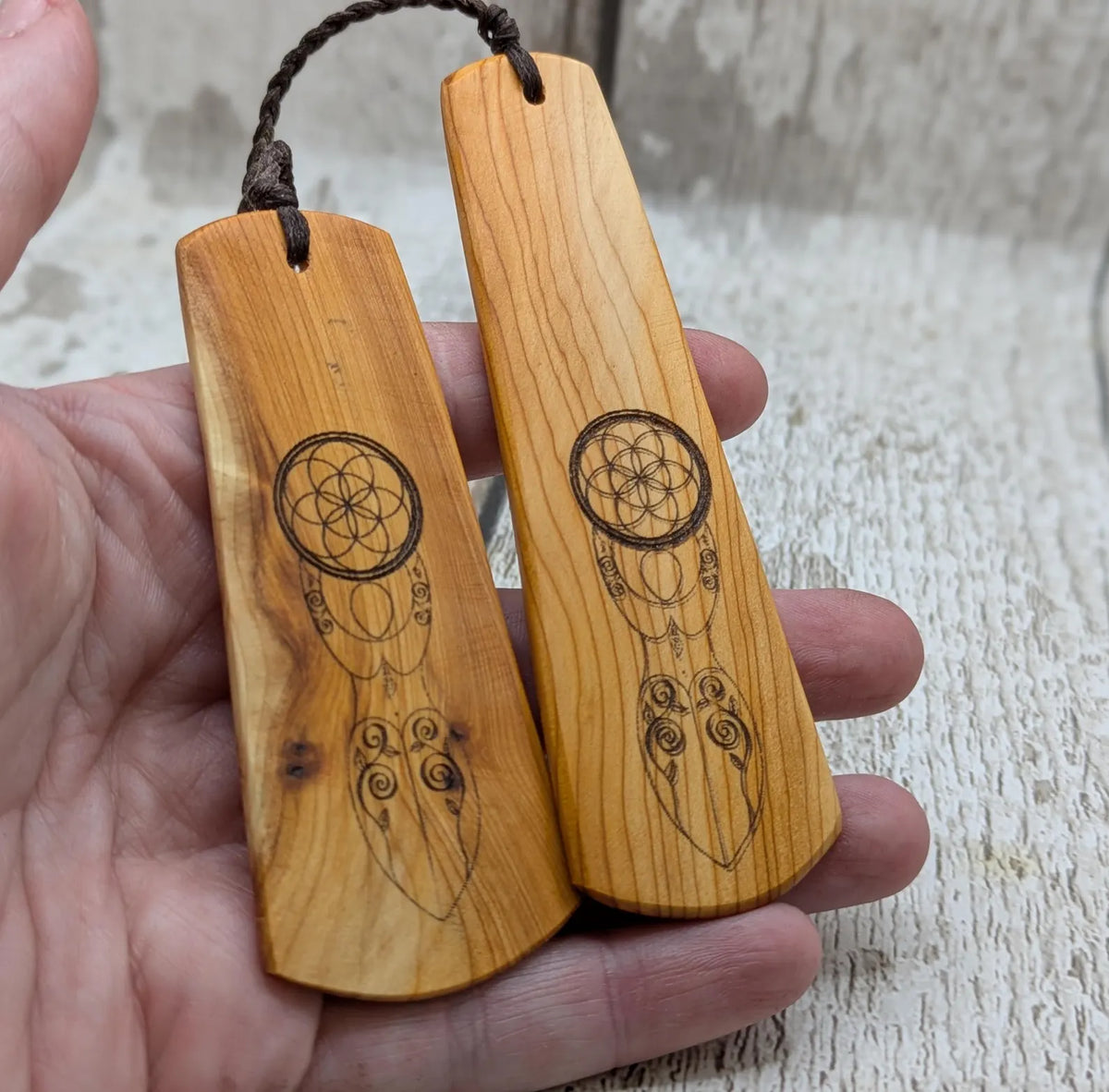 Yew wood, goddess print bookmark with pāua abalone bead tassel.