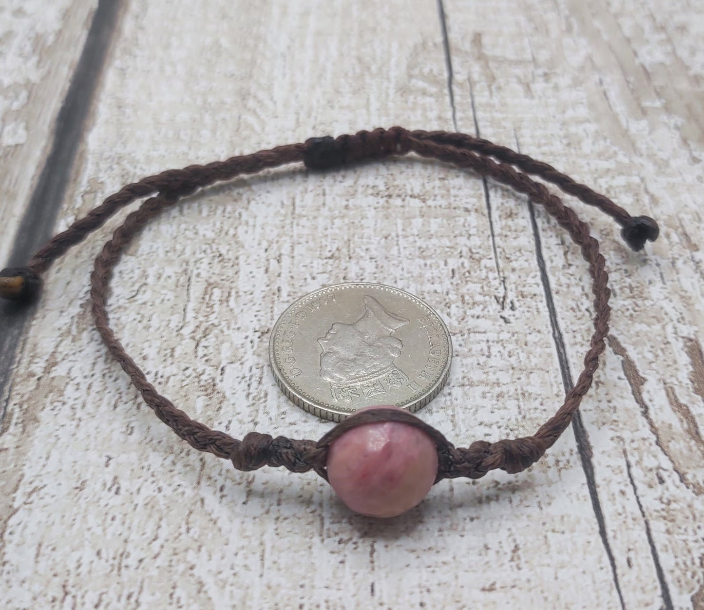 Rhodochrosite macrame woven adjustable bracelet.