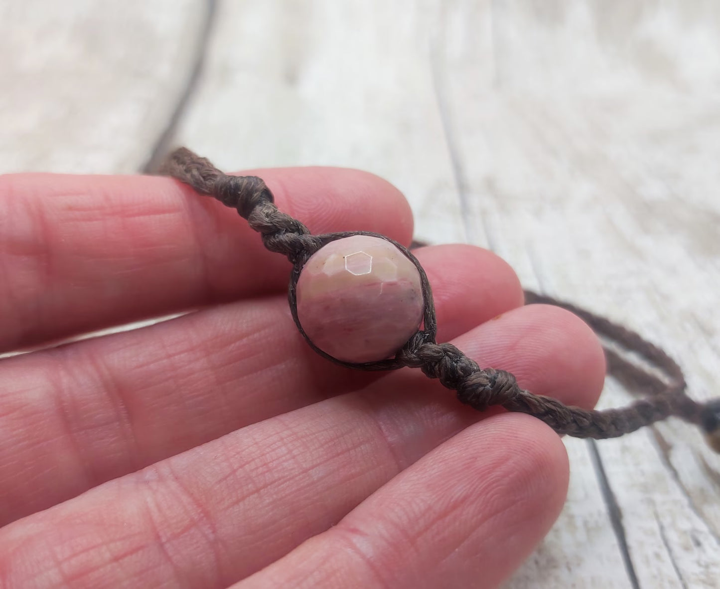 Rhodochrosite macrame woven adjustable bracelet.