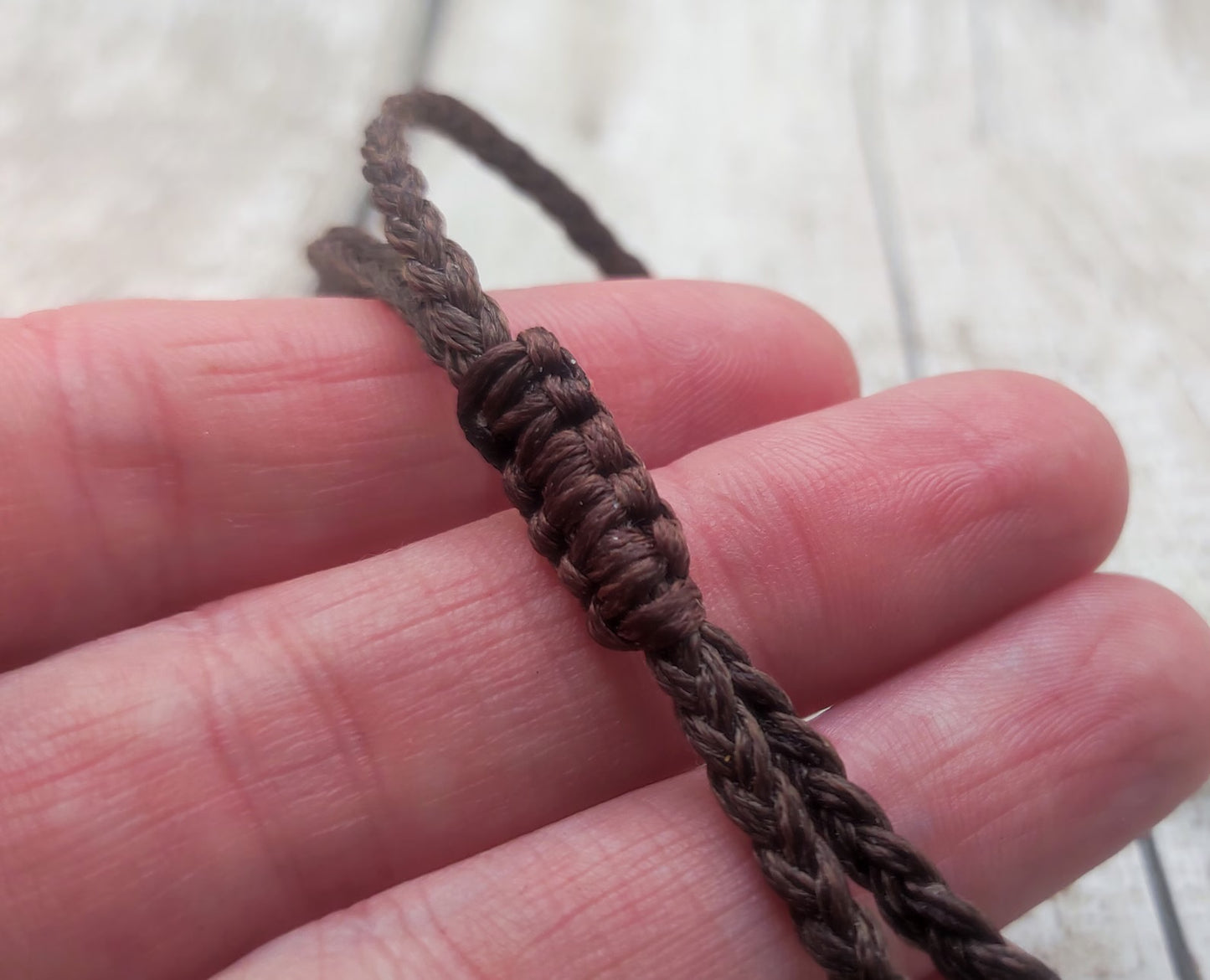 Rhodochrosite macrame woven adjustable bracelet.